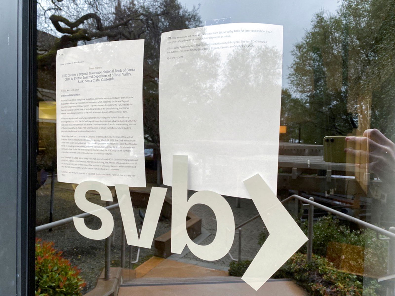 A locked door to a Silicon Valley Bank location on Sand Hill Road is seen in Menlo Park, California, March 10, 2023.