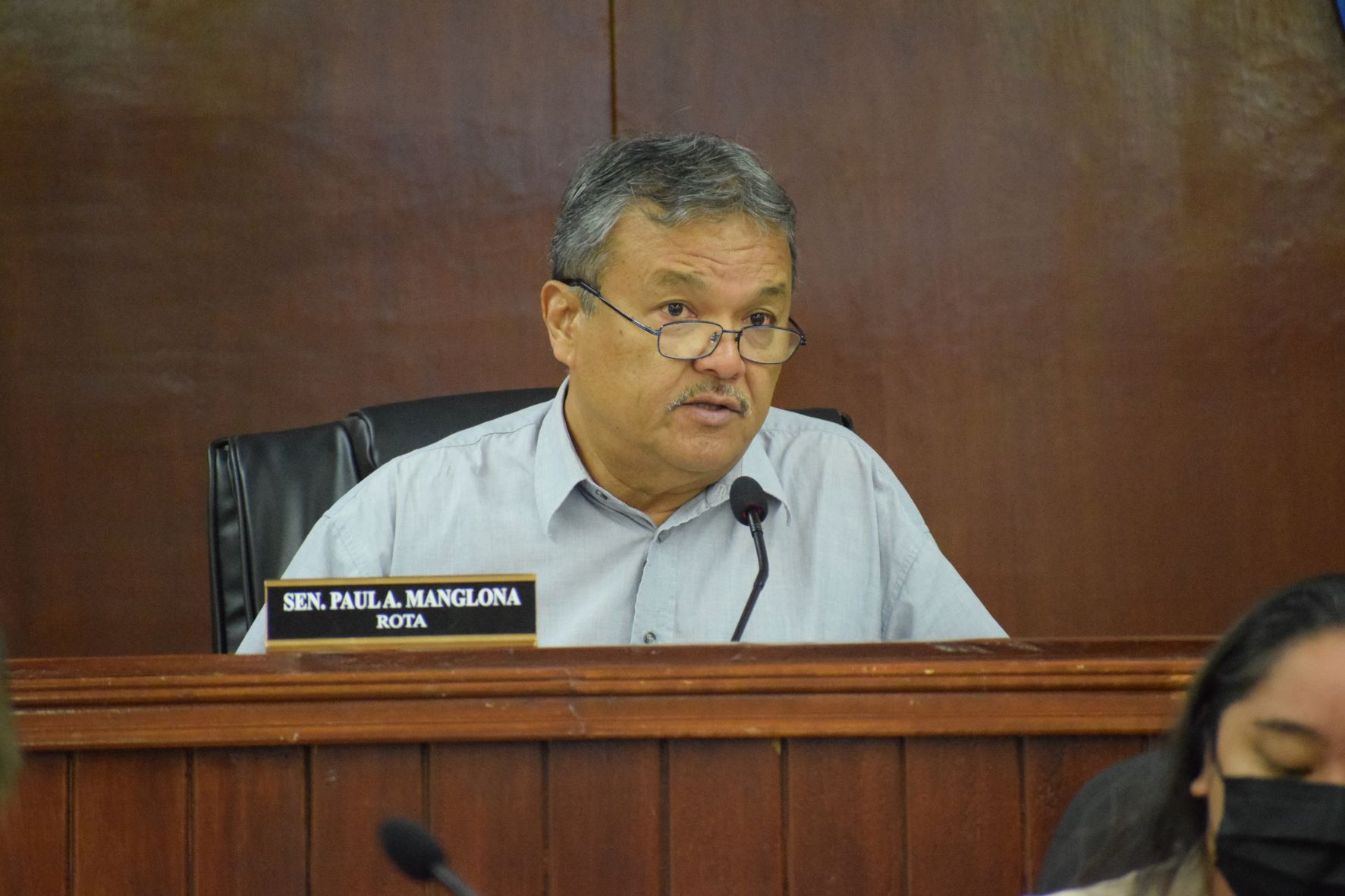 Sen. Paul A. Manglona speaks during a committee meeting in the Senate chamber in January.