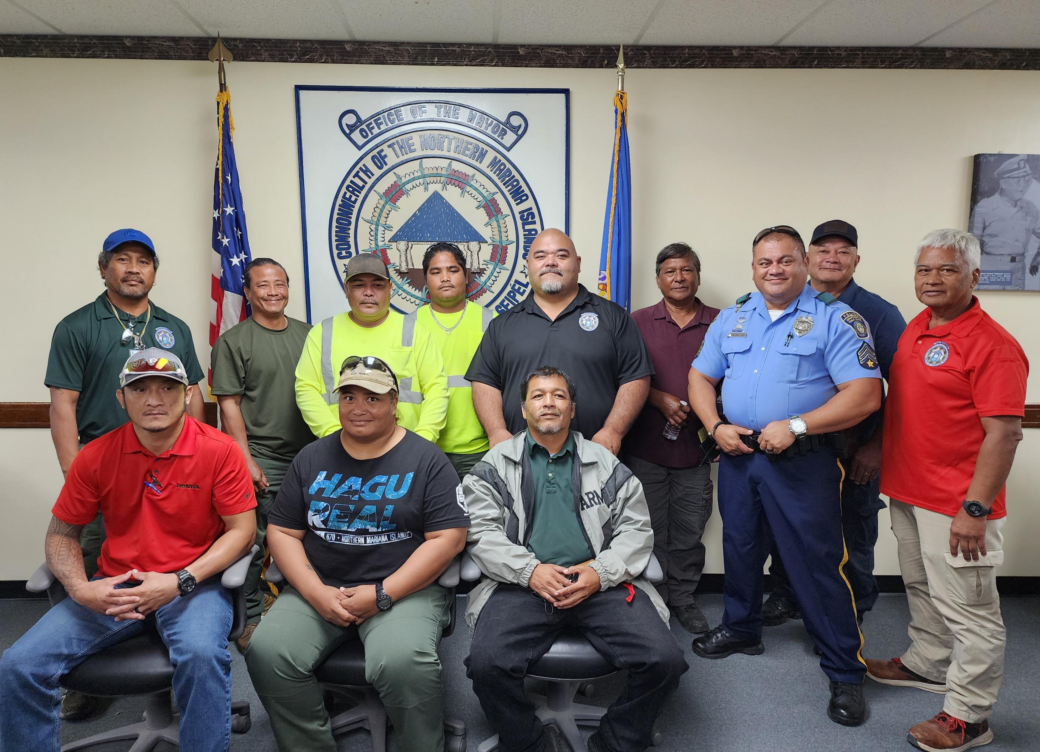 Saipan Mayor’s Office personnel undergoing roadside safety training pose for a photo with Department of Safety’s Highway Patrol officers on Wednesday.
