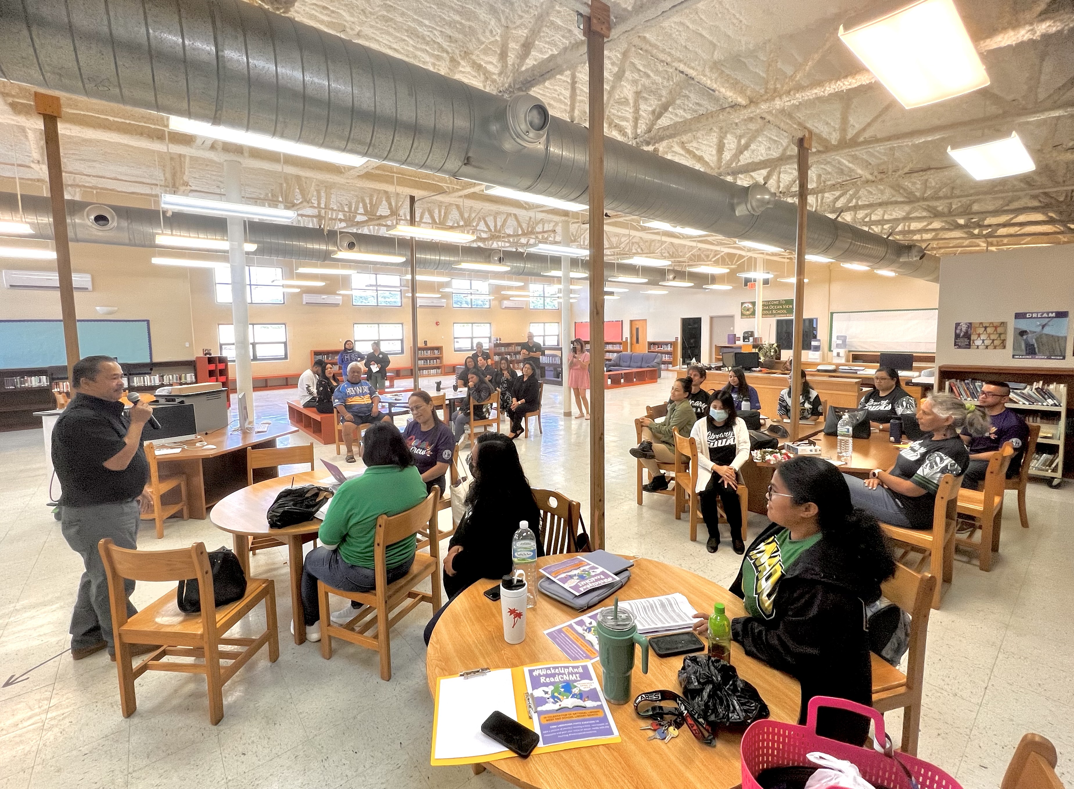Commissioner of Education Dr. Alfred B. Ada, left, described  public school librarians as the students’ “champions.”
