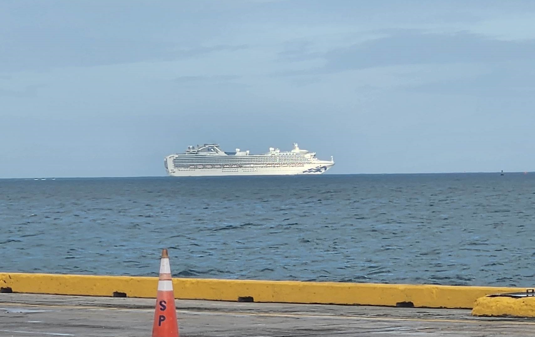 The Diamond Princess is seen outside the reef of the Saipan lagoon on Saturday morning.