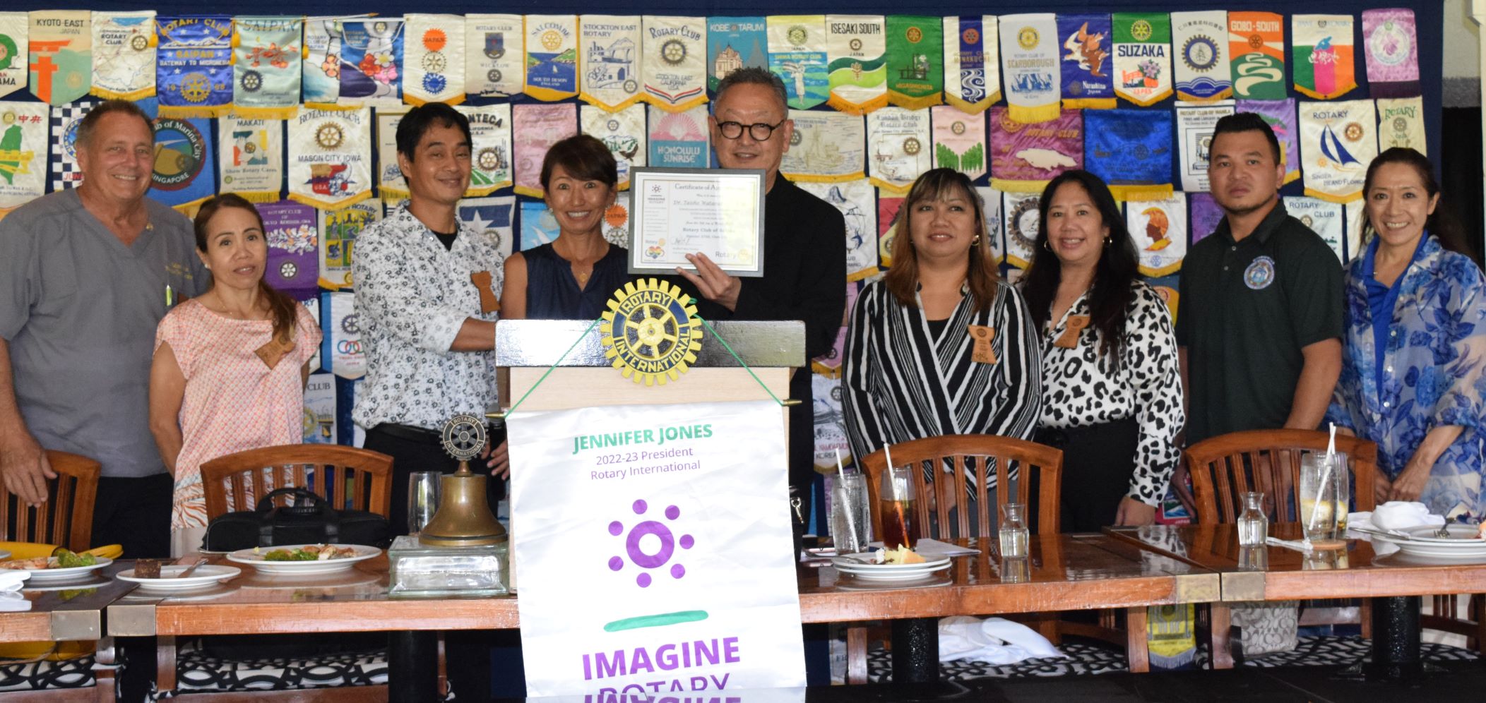 Dr. Taisho Watanabe of the Veterinary Center of Japan receives a plaque of appreciation from Rotary Club of Saipan President Wendell Posadas and other Rotarians. Also in photo: Saipan Mayor Office Dog Control Program Manager Martin Pangelinan Jr., second right.