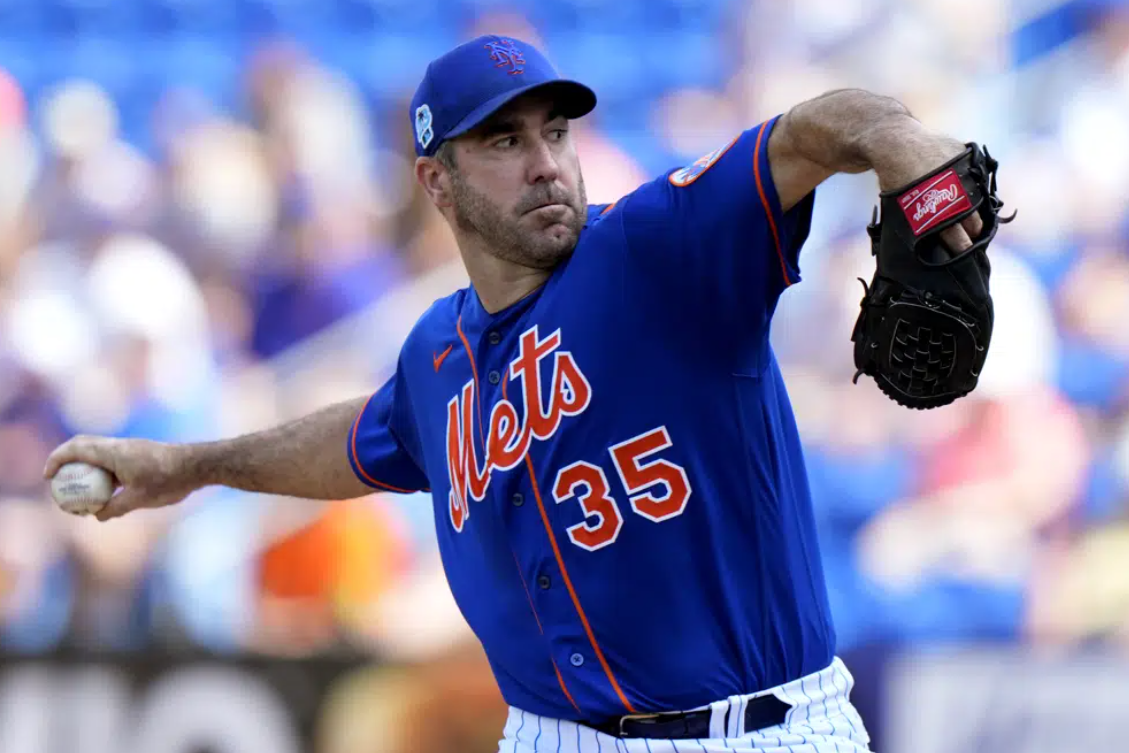 New York Mets starting pitcher Justin Verlander (35) throws during the first inning of a spring training baseball game against the Houston Astros, Friday, March 10, 2023, in Port St. Lucie, Fla.