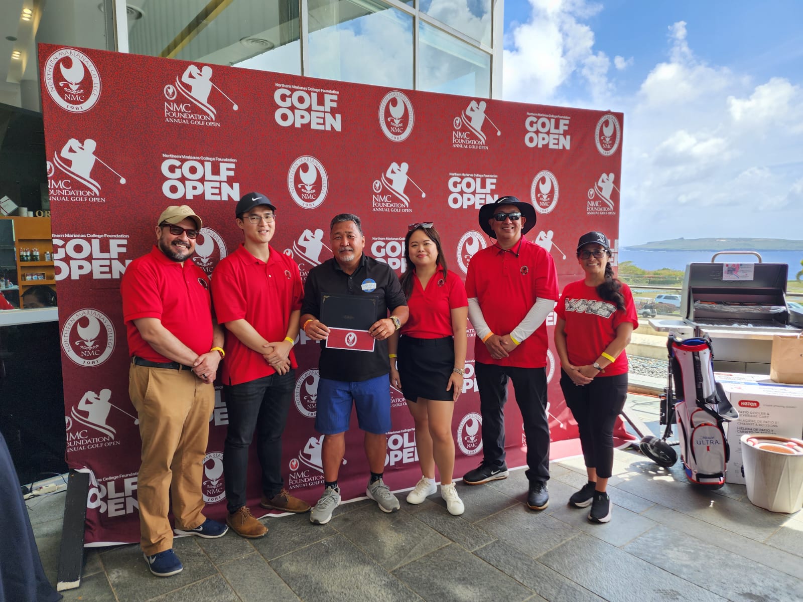 Michael Castro, winner of the seniors open flight, poses for a photo with Northern Marianas College President Galvin Deleon Guerrero, EdD, NMC Foundation board member Michael Sheu, NMC Regent Michelle Sablan, NMC Regent Jesse Tudela and NMC Foundation board member Tayna Belyeu-Camacho during the NMC Golf Open awards ceremony  at the LoaLao Bay Golf & Resort on Sunday.  