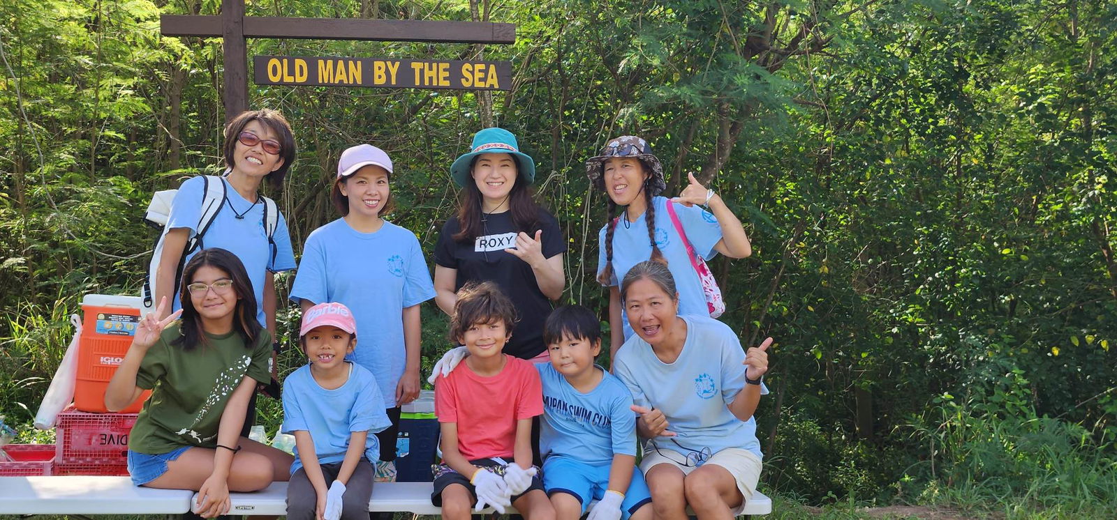 Some of the volunteers who cleaned up Old Man by the Sea over the weekend pose for a photo.