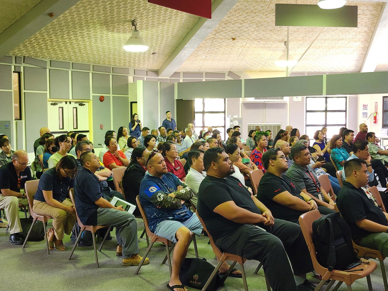 Business owners or their representatives listen to a Joint Region Marianas presentation on the U.S. military’s Morale, Welfare, and Recreation program and how businesses can tap into the military market at the multi-purpose center on Tuesday.