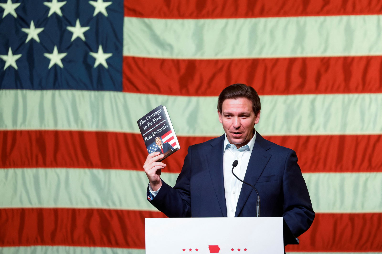 Florida Governor Ron DeSantis arrives onstage for his first trip to the early voting state of Iowa for a book tour stop at the Rhythm City Casino Resort in Davenport, Iowa, March 10, 2023.