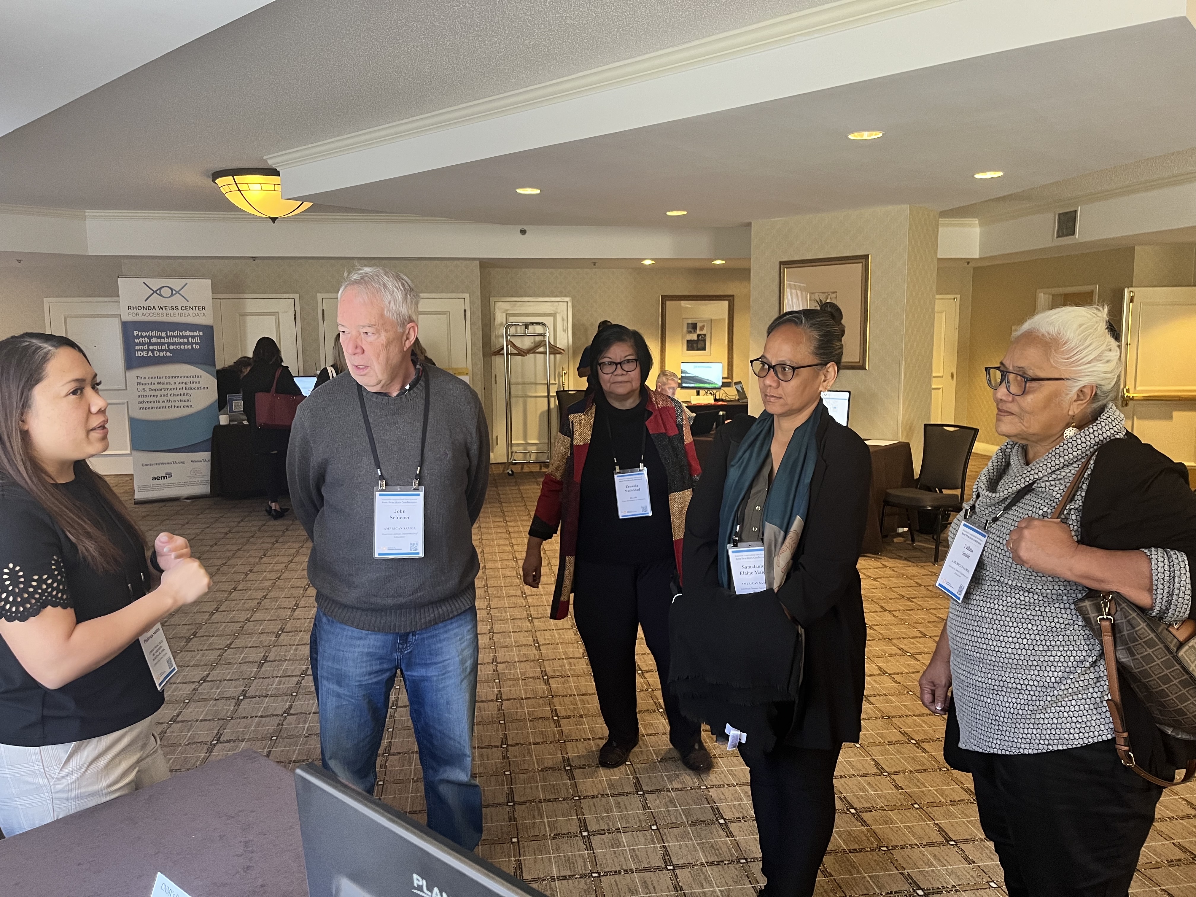 PSS-SLDS Program Director Annette Pladevega-Sablan engages with her American Samoa and Guam counterparts.