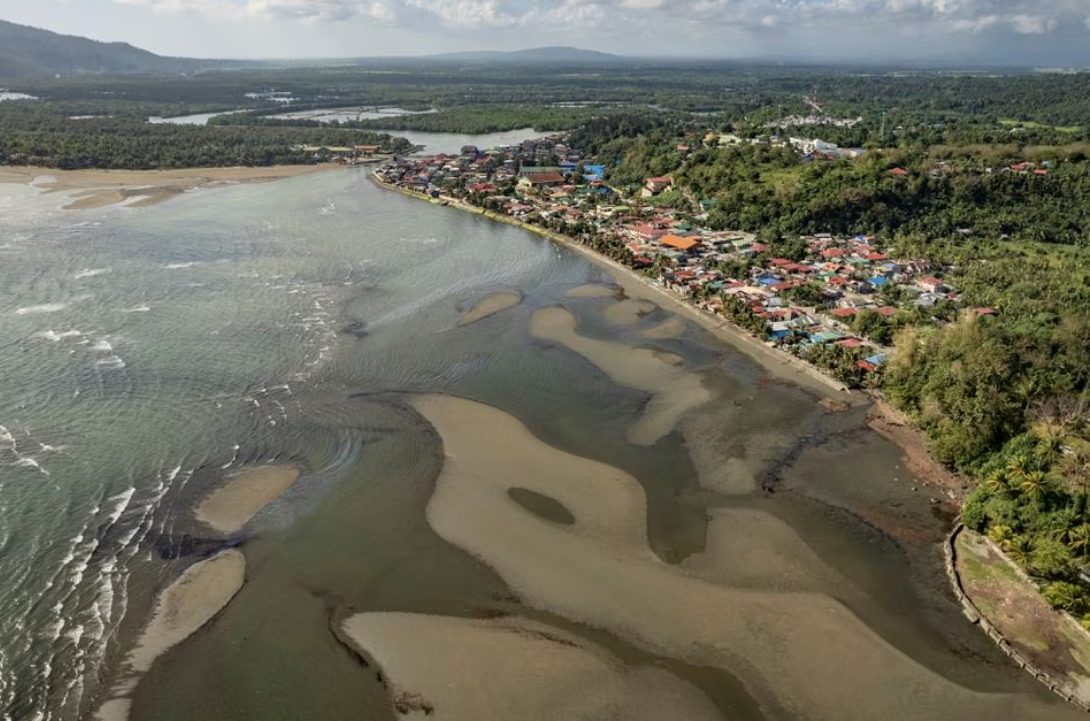 An aerial view shows the oil spill from the sunken fuel tanker MT Princess Empress on the shores of Pola, in Oriental Mindoro province, the Philippines, March 8, 2023.