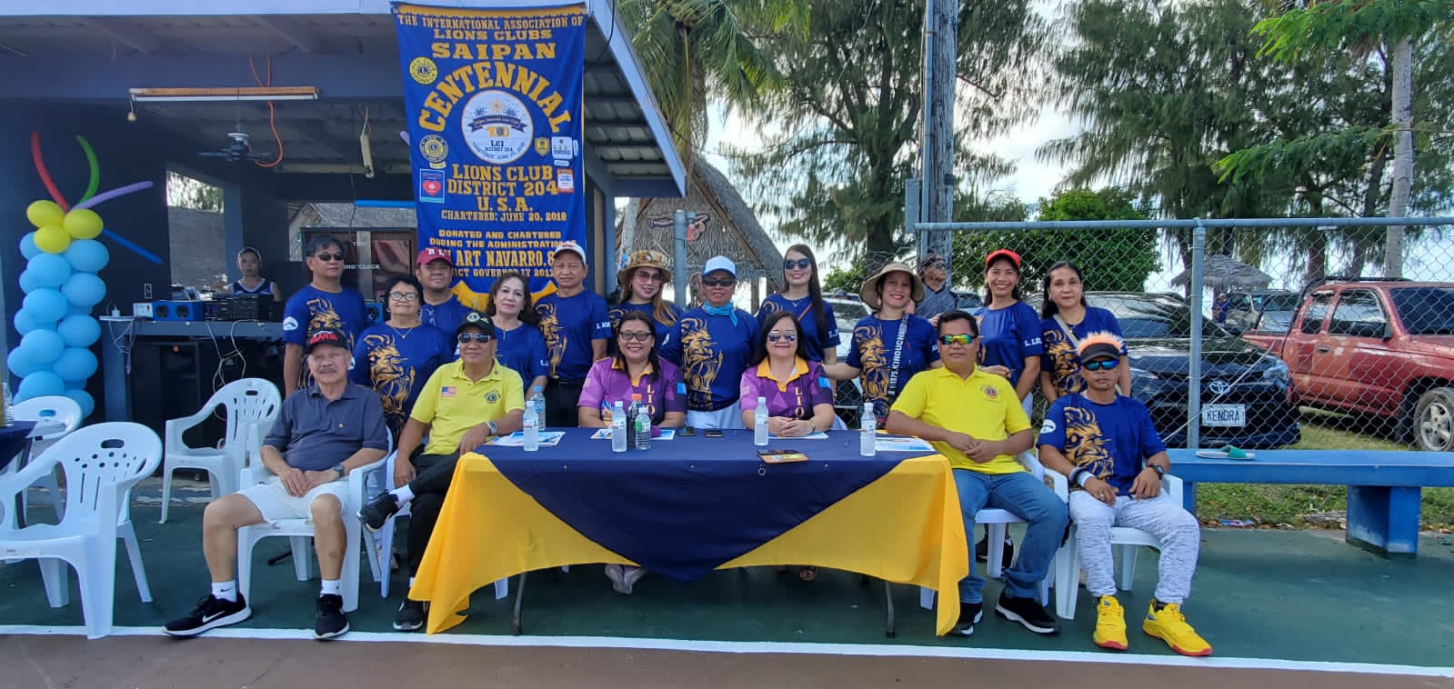 The Saipan Centennial Lions Club members pose for a photo with district and regional officers during the opening ceremony of the SCLC Basketball League, season two, at the Civic Center basketball court on Sunday, March 19, 2023.