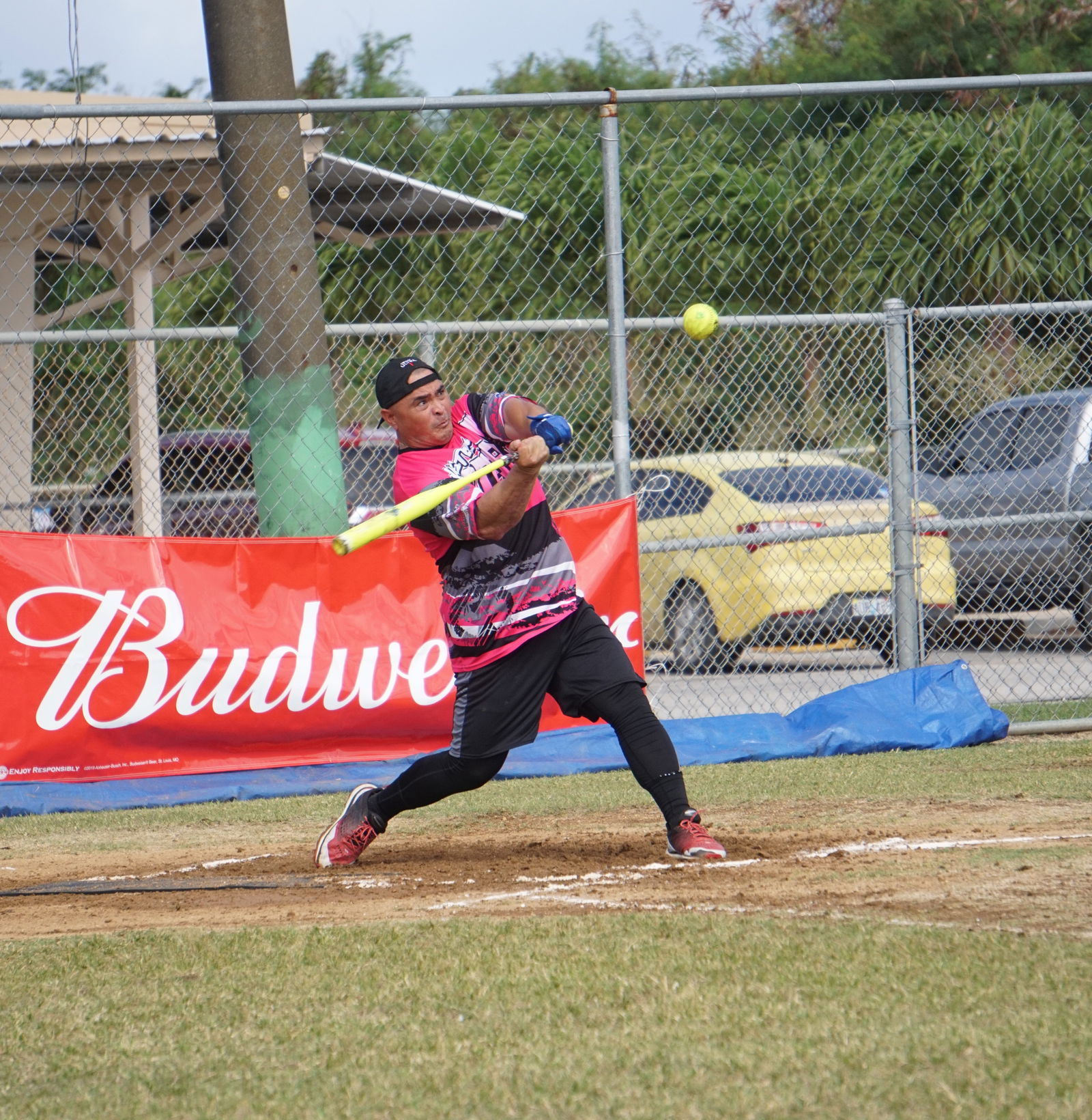 Sufa's Audie Maratita connects a three-run homer during a men's division game of the 2023 Budweiser Belau Amateur Softball League on Sunday at the Dandan baseball field.