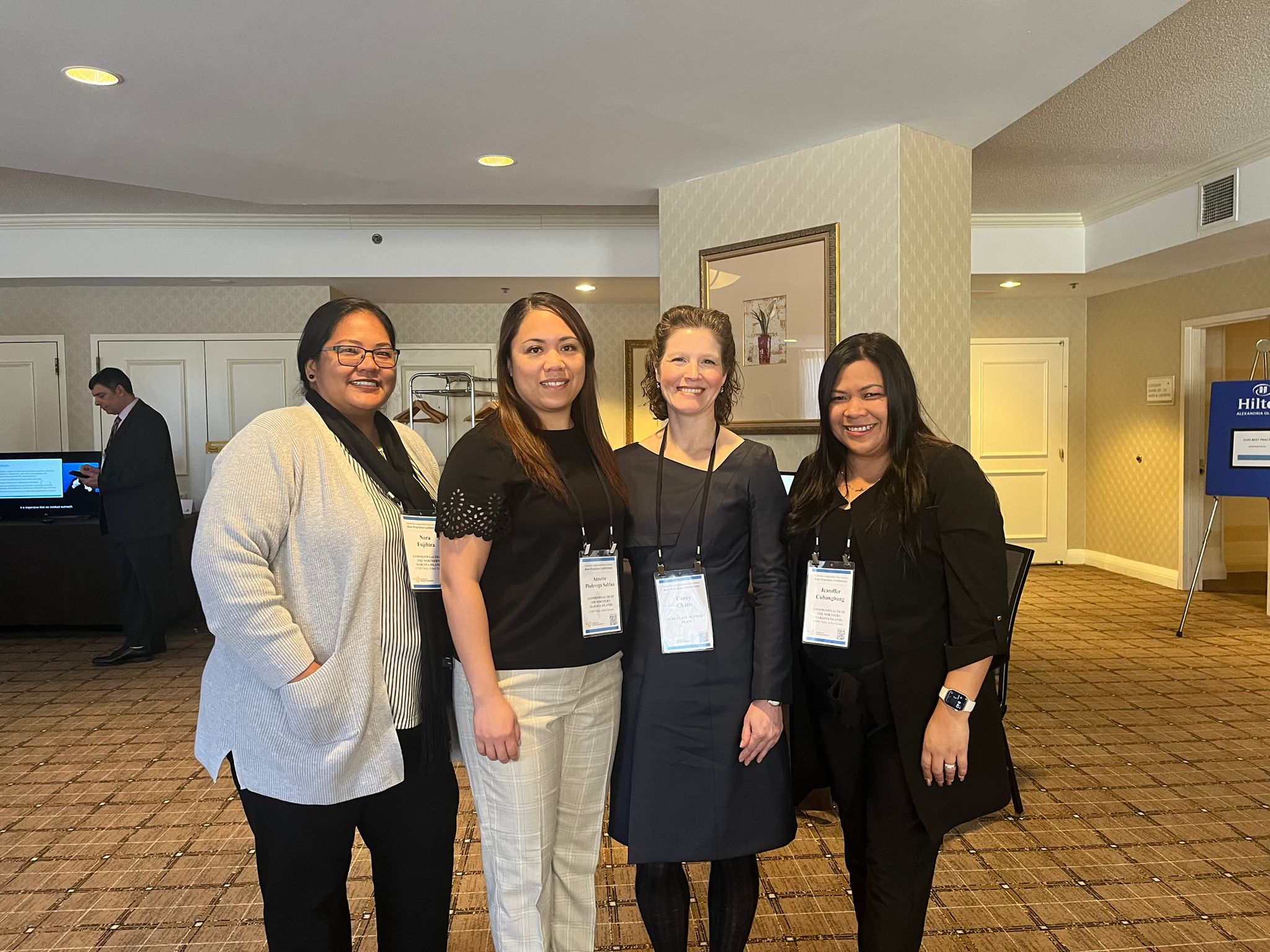 CNMI PSS’ Nora Fujihira, Annette Pladevega and Jeaniffer Cubangang with Corey Chatis, a member of  a PSS grantor's State Support Team and the lead technical assistance provider for the CNMI PSS-SLDS.