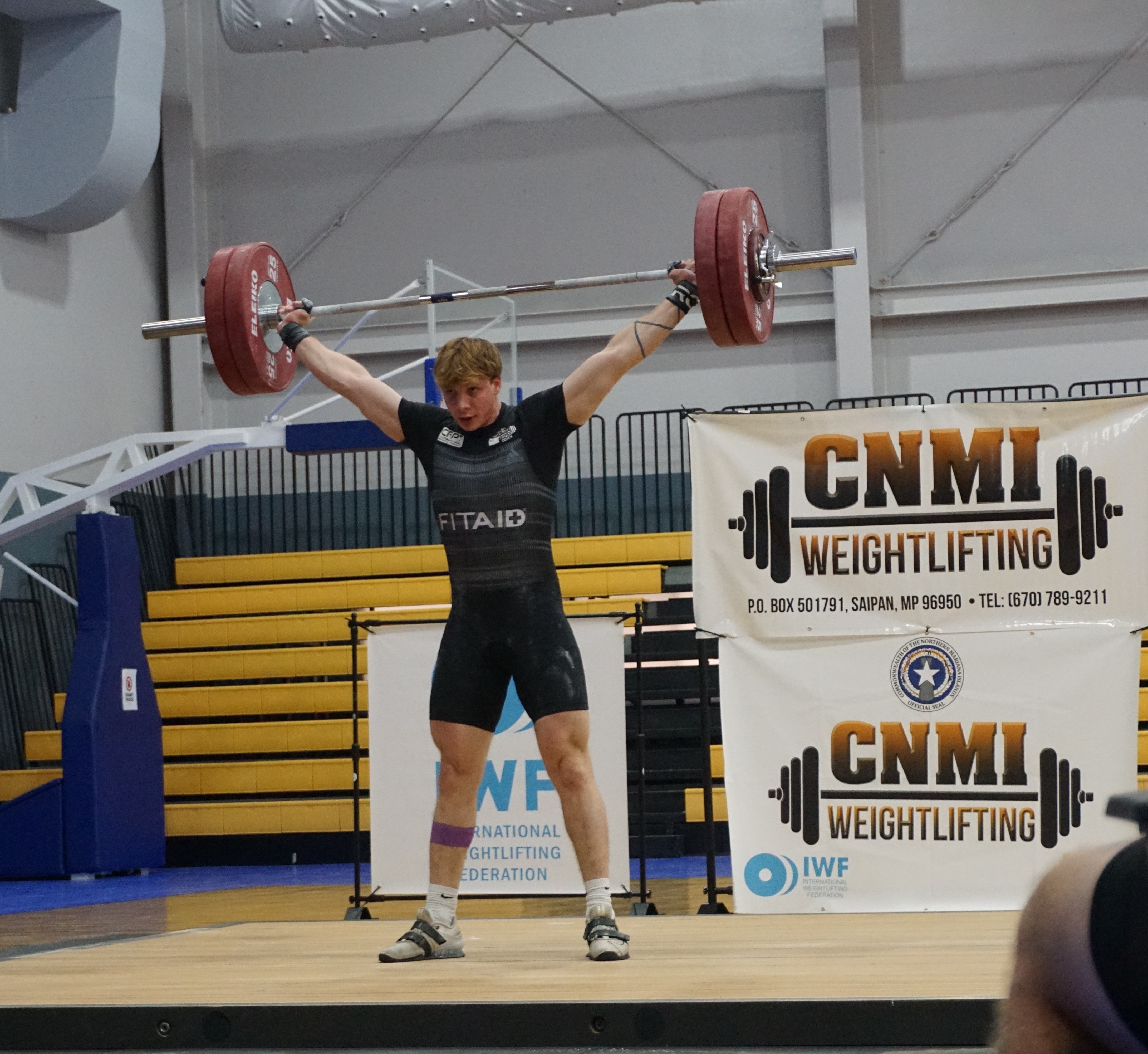 Guam's Ethan Elwell is successful with his snatch attempt of 145kg during the CNMI Weightlifting Marianas Cup on Saturday at the Ada gym.