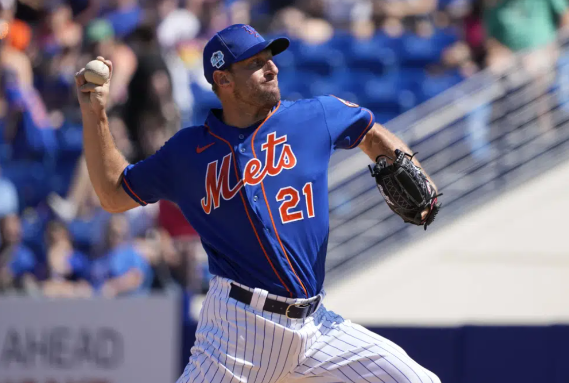 New York Mets starting pitcher Max Scherzer throws during the first inning of a spring training baseball game against the Washington Nationals Sunday, Feb. 26, 2023, in Port St. Lucie, Fla.