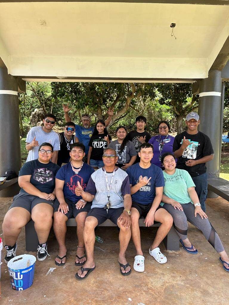 Community volunteer  Max Aguon with St. Judge Youth Ministry members Devon Pangelinan, Jayana Socorro, Joshua Socorro, Lemusu To'omata, Tiava To'omata Gracie Mendiola, Kyle DeLeon Guerrero, Maximus Gabionza, Andreas Nemesio Saito, Emirina Chong and TJ Chong.