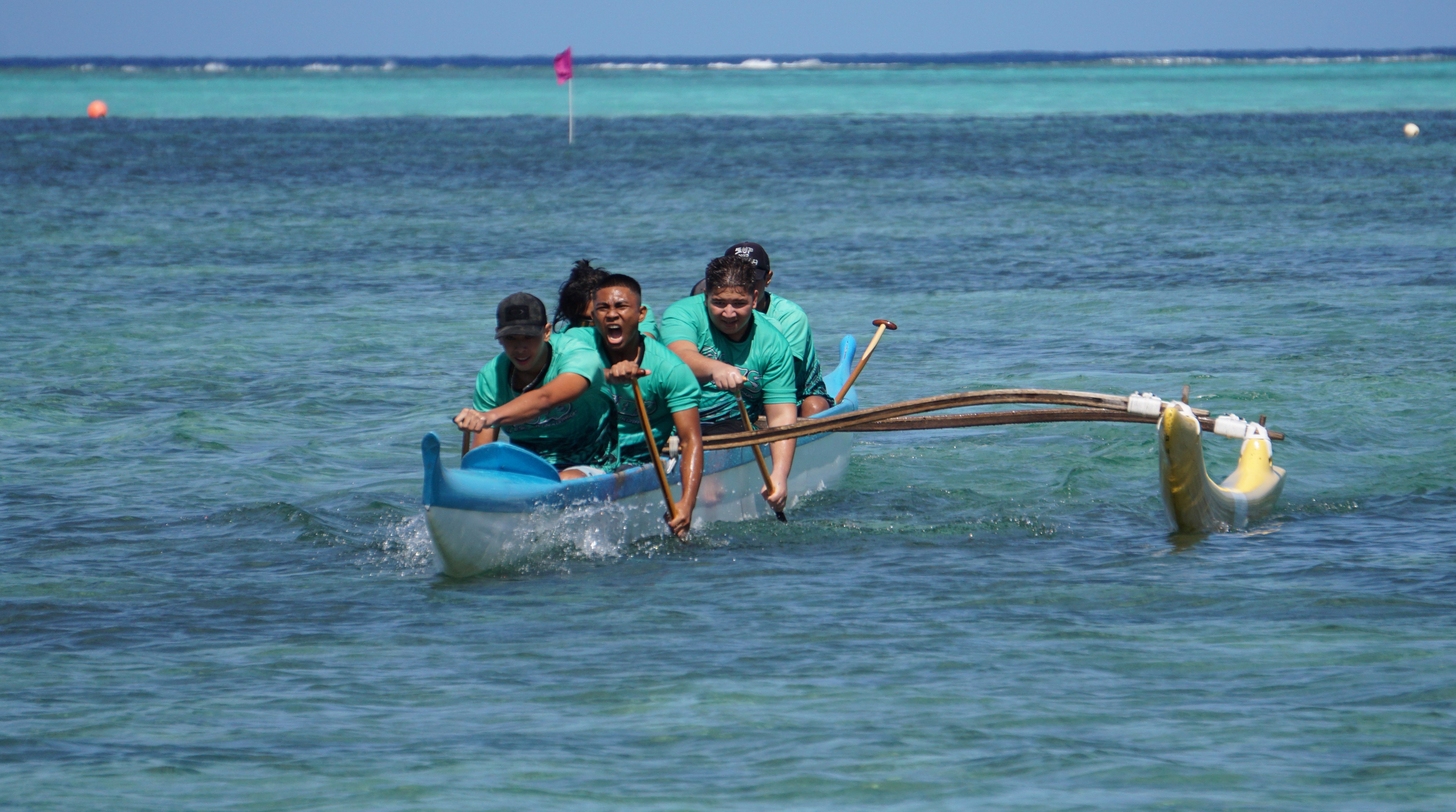 The boys of Saipan Southern High School approach the finish line in the 500m event of the PSS Interscholastic Outrigger Race Series at Kilili Beach on Saturday.
