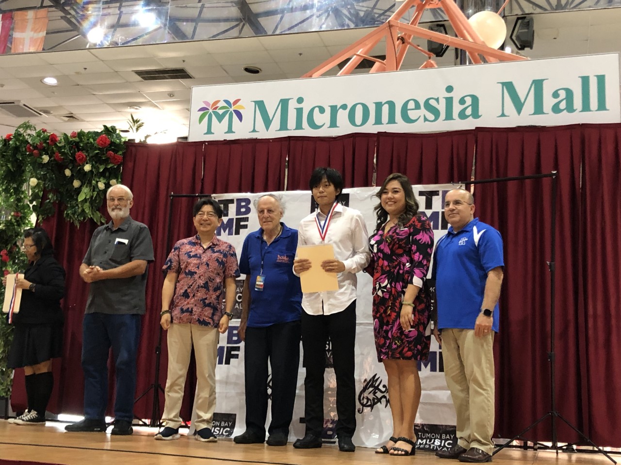 Silver medalist Eric Lai, 3rd right.