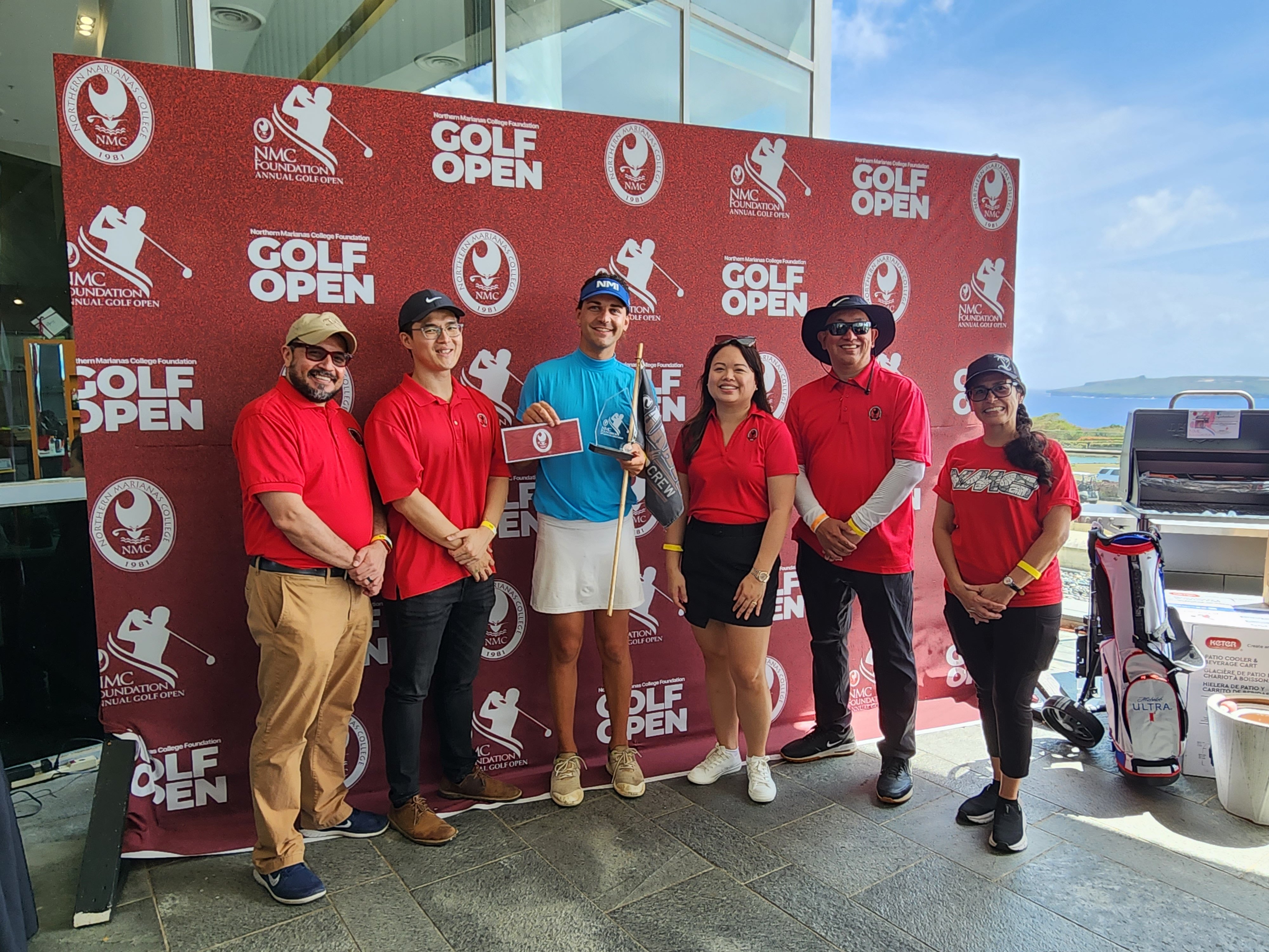 Dominic Kieffer, 3rd left, the championship flight winner, poses for a photo with Northern Marianas College President Galvin Deleon Guerrero, EdD, NMC Foundation board member Michael Sheu, NMC Regent Michelle Sablan, NMC Regent Jesse Tudela and NMC Foundation board member Tayna Belyeu-Camacho during the NMC Golf Open awards ceremony  at the LoaLao Bay Golf & Resort on Sunday.