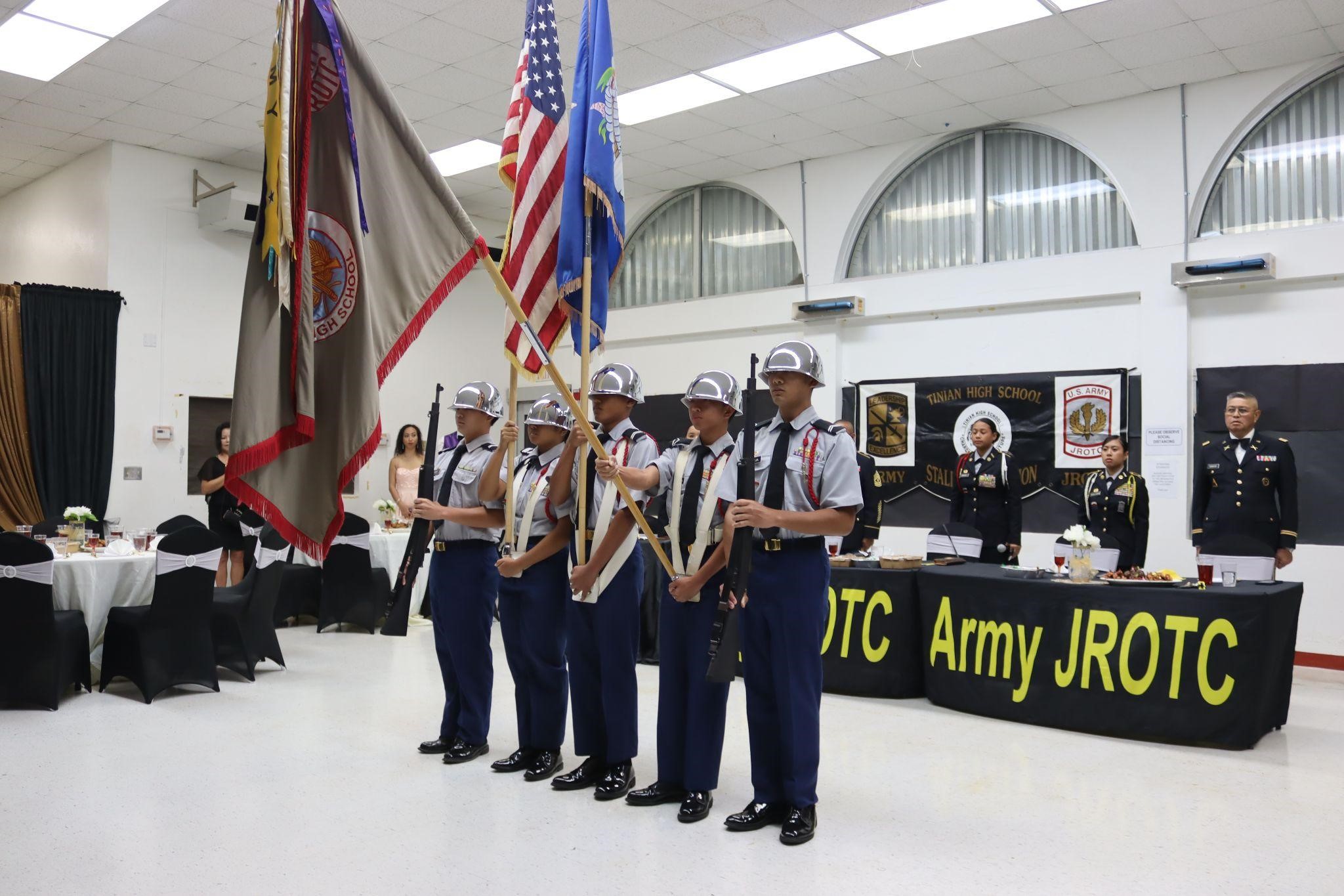 The Stallion Battalion Color Guard presents the flags.