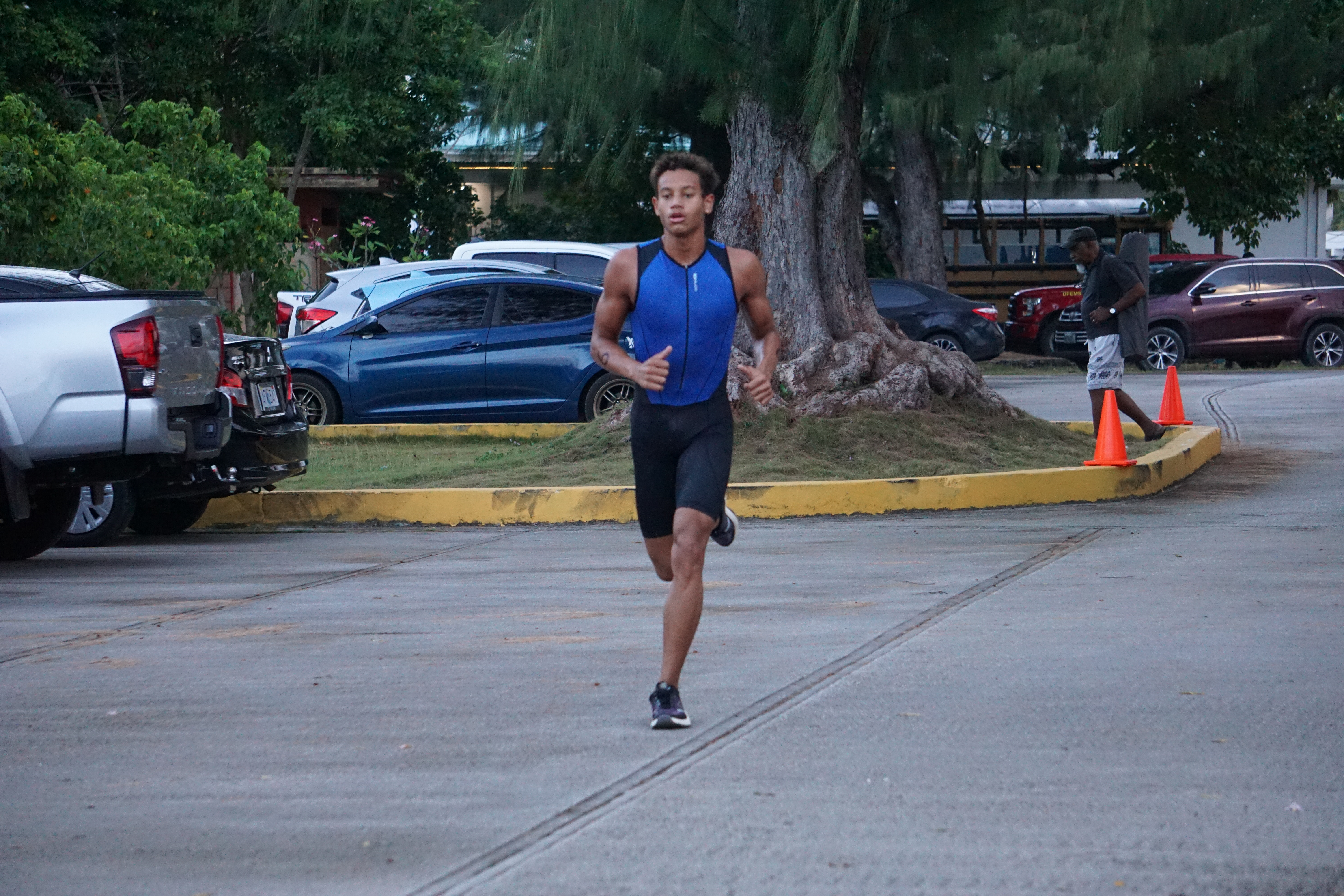 Isaiah Aleksenko completes the first 1.5KM foot race of the TRAC’s 8th Aquathlon on Saturday in the Kilili Beach Park area.