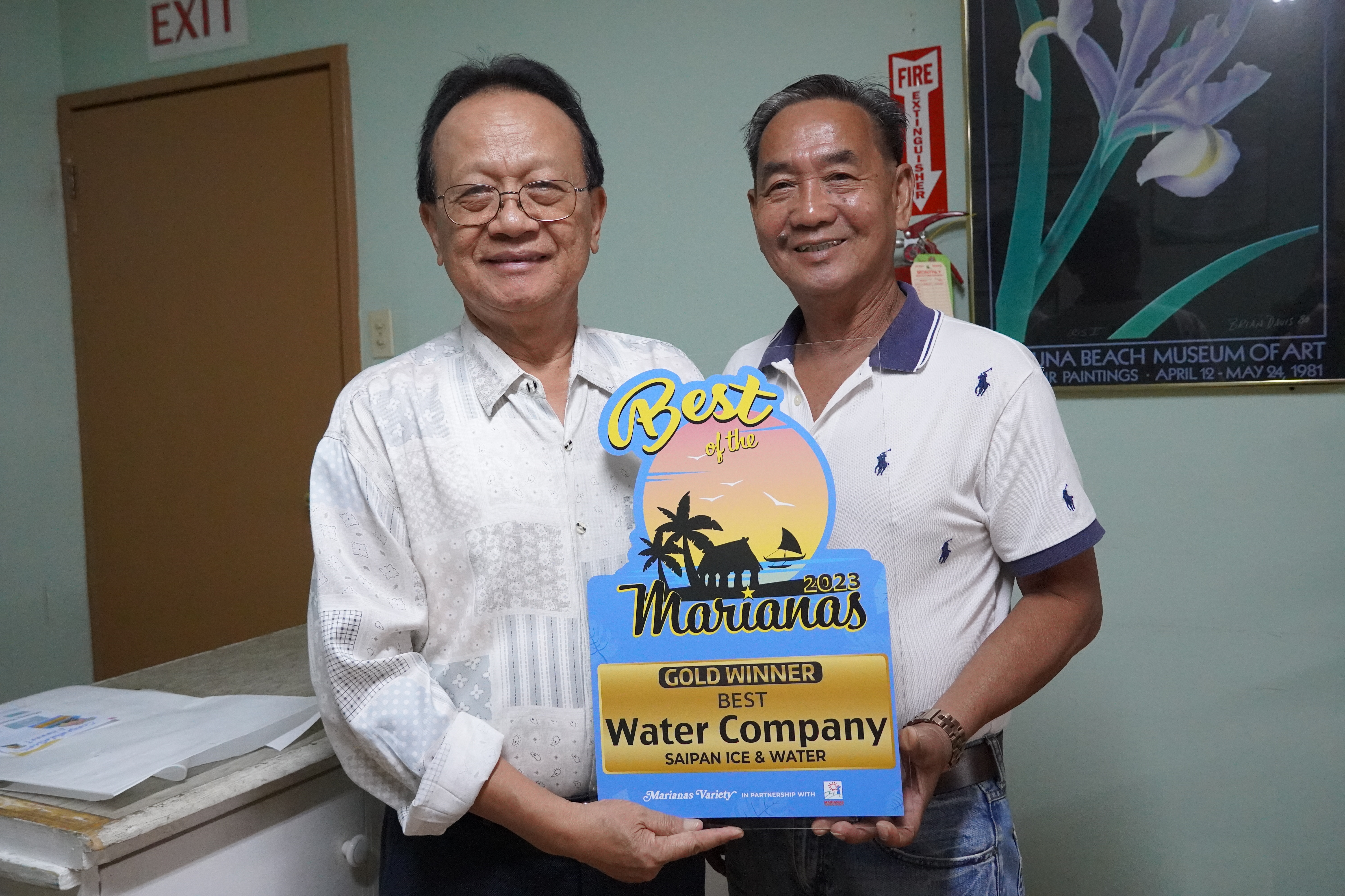 Saipan Ice & Water Co. Inc. Chief Financial Officer Armand Amog and Sales Manager Lito Dizon receive the gold award for the Best Water Company category.
