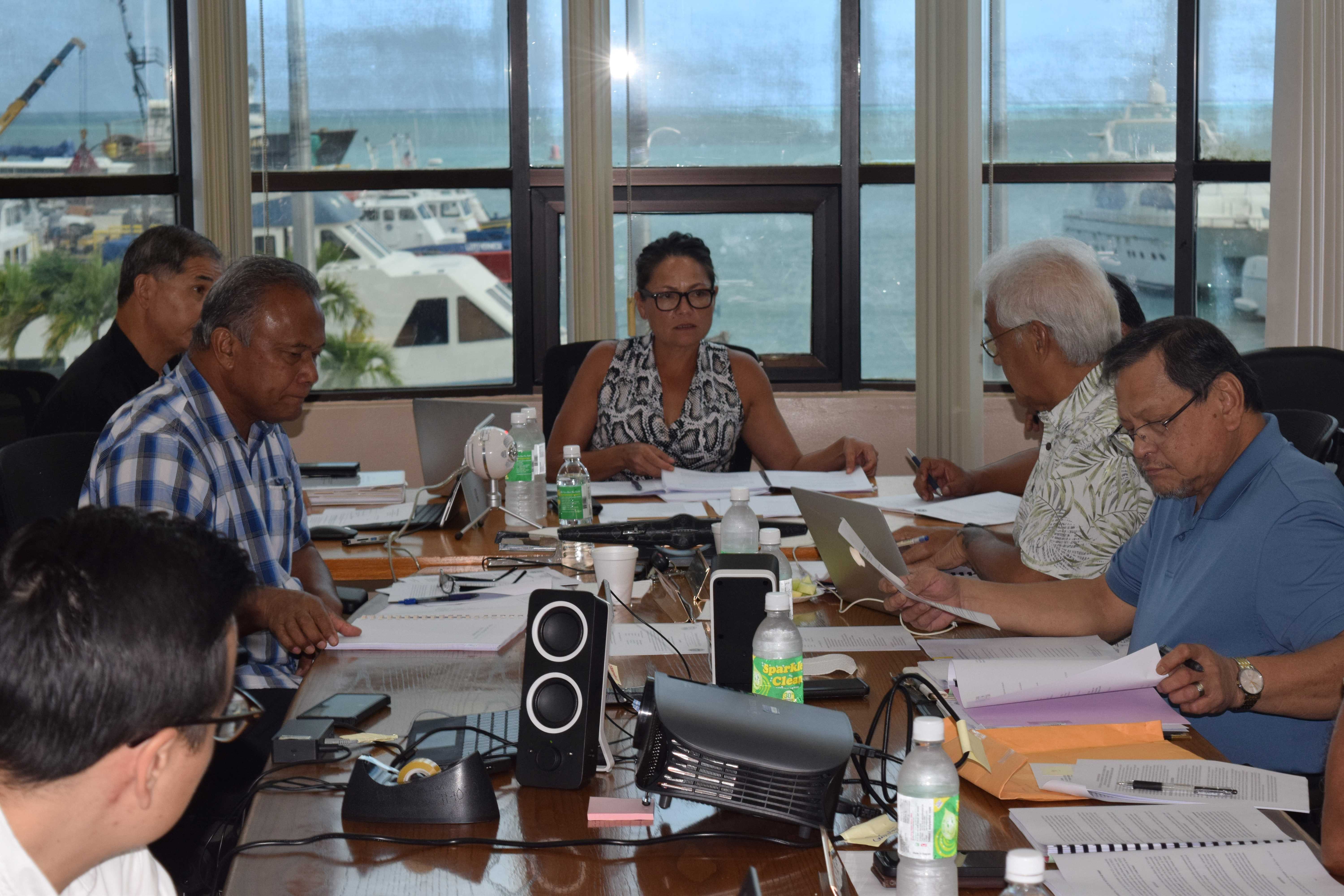 Commonwealth Ports Authority Chairwoman Kimberlyn King-Hinds, center background, presides over a board meeting on Tuesday. Also in photo are board members Ramon A. Tebuteb, Thomas "Kiyu' Villagomez and Joseph Diaz.