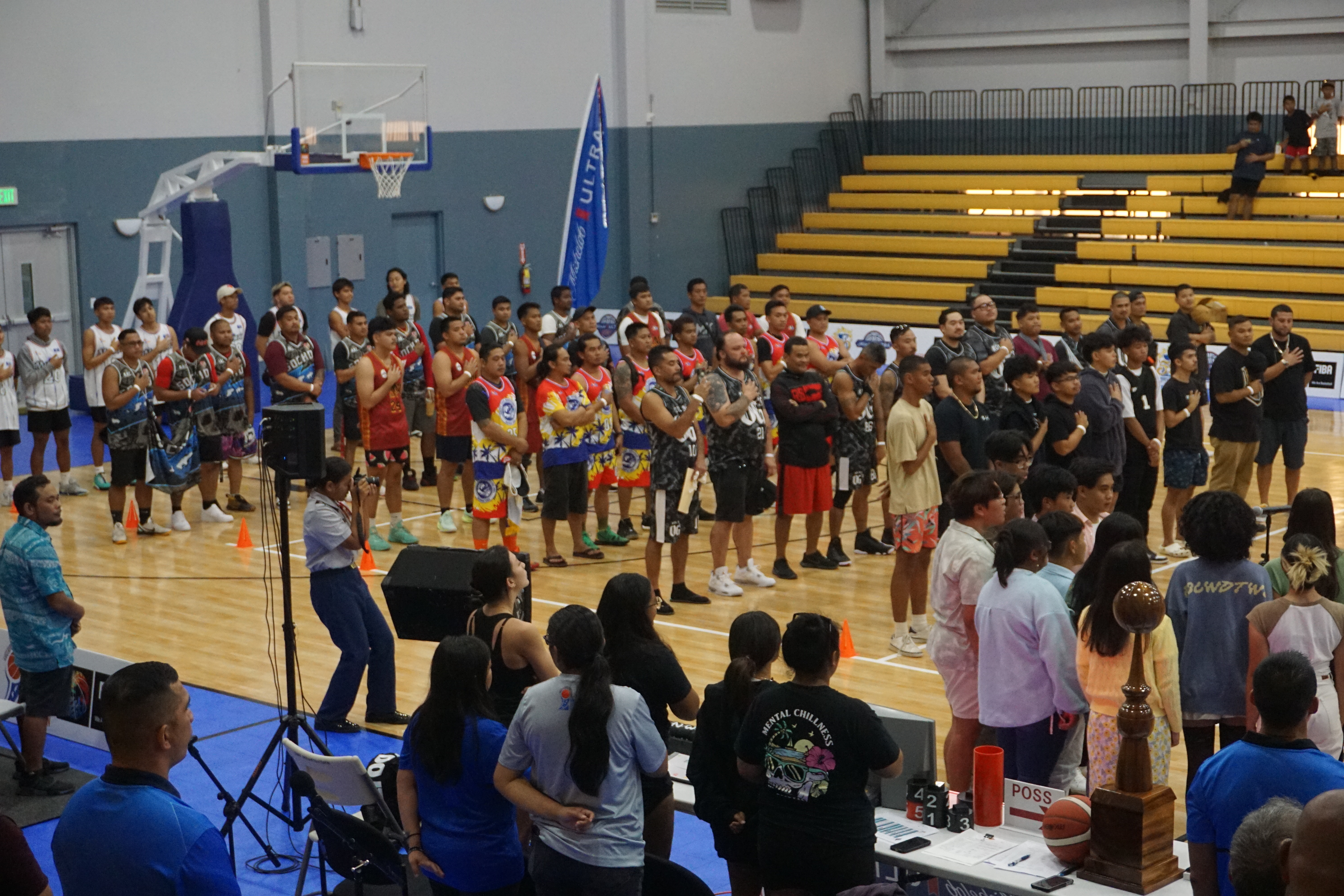The participating teams during the singing of the national anthem.