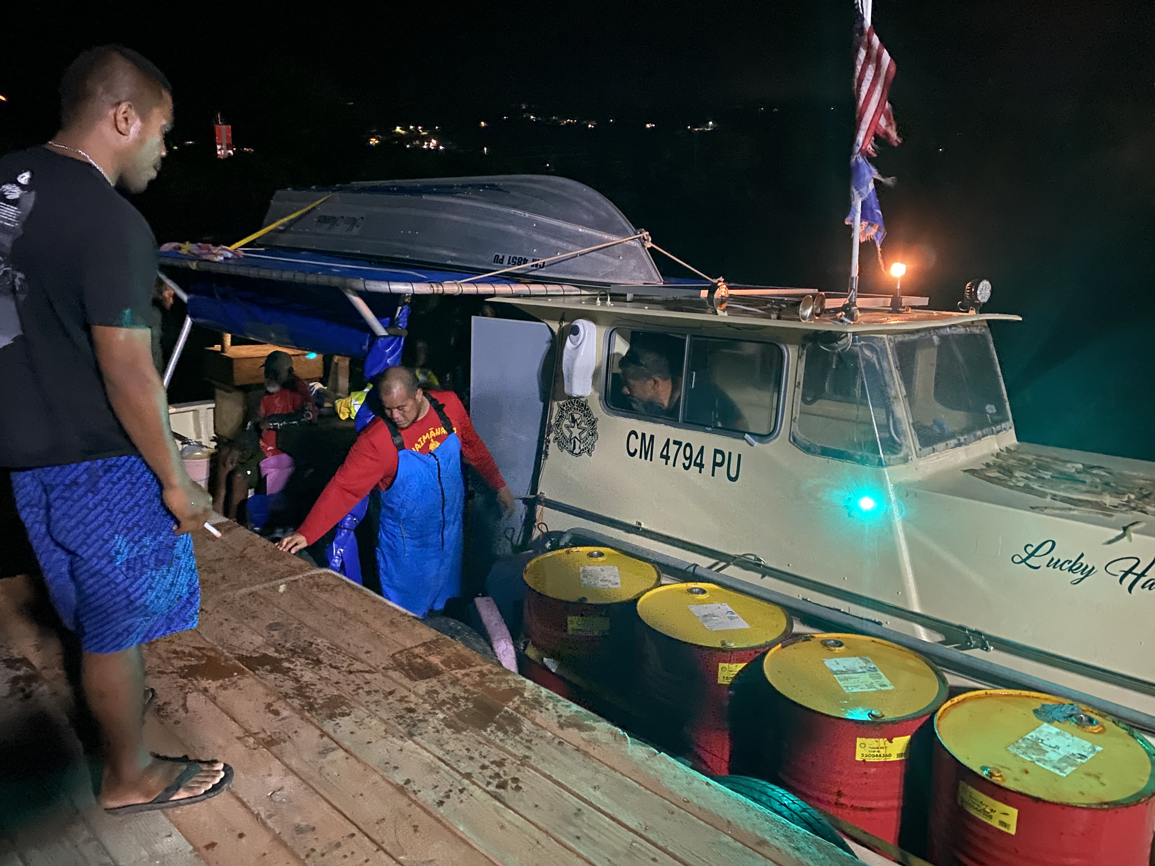 The Lucky Harvest arrives on island, captained by Master Navigator Cecelio Raiukiulipiy. Also in photo is Junior Coleman, 500 Sails director of sailing and seamanship.