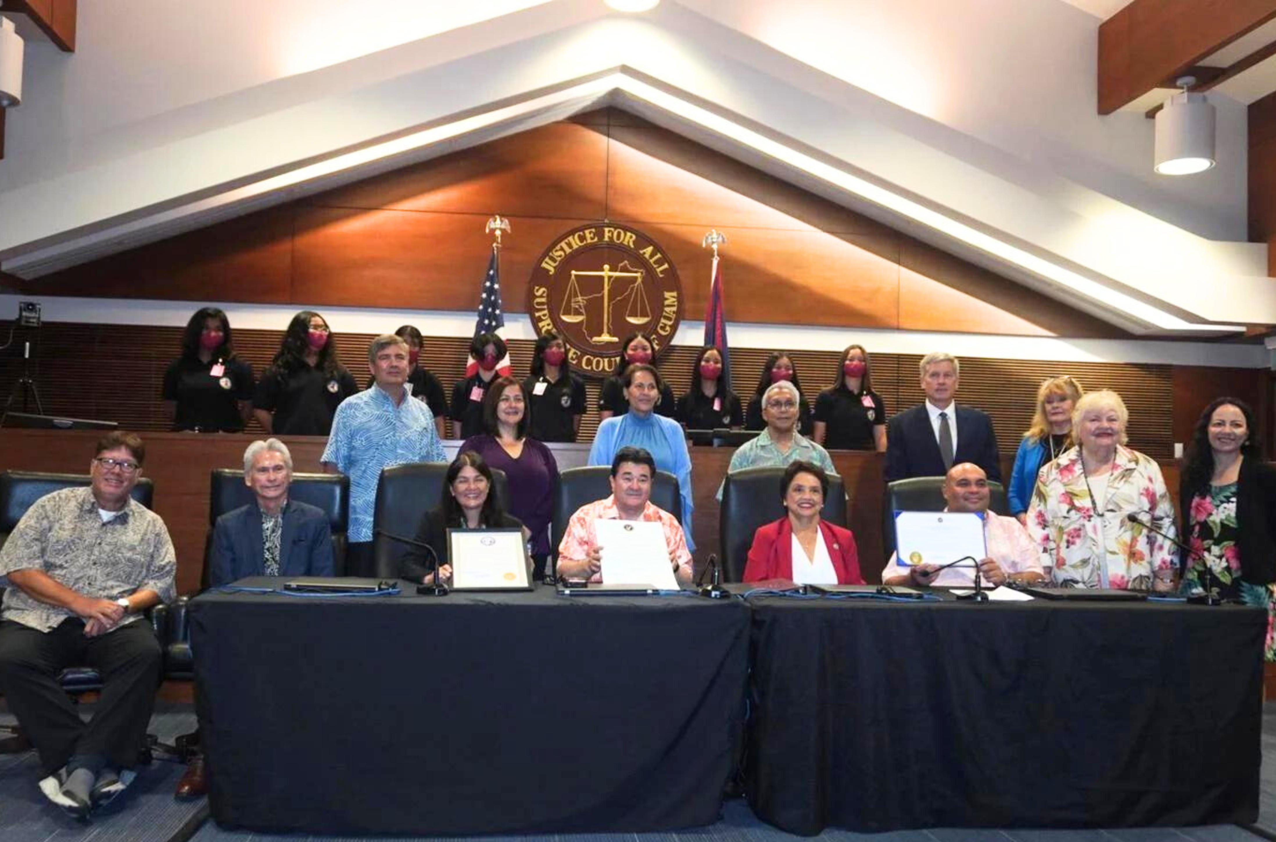 Members of the Judiciary of Guam, along with Gov. Lou Leon Guerrero and Lt. Gov. Josh Tenorio, sign a proclamation to declare May 1-5 Law Week, on Friday, April 21, 2023, in Hagåtña.  