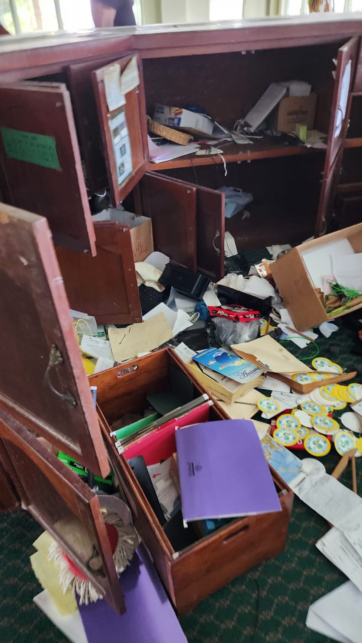 Office cabinets in total disarray.