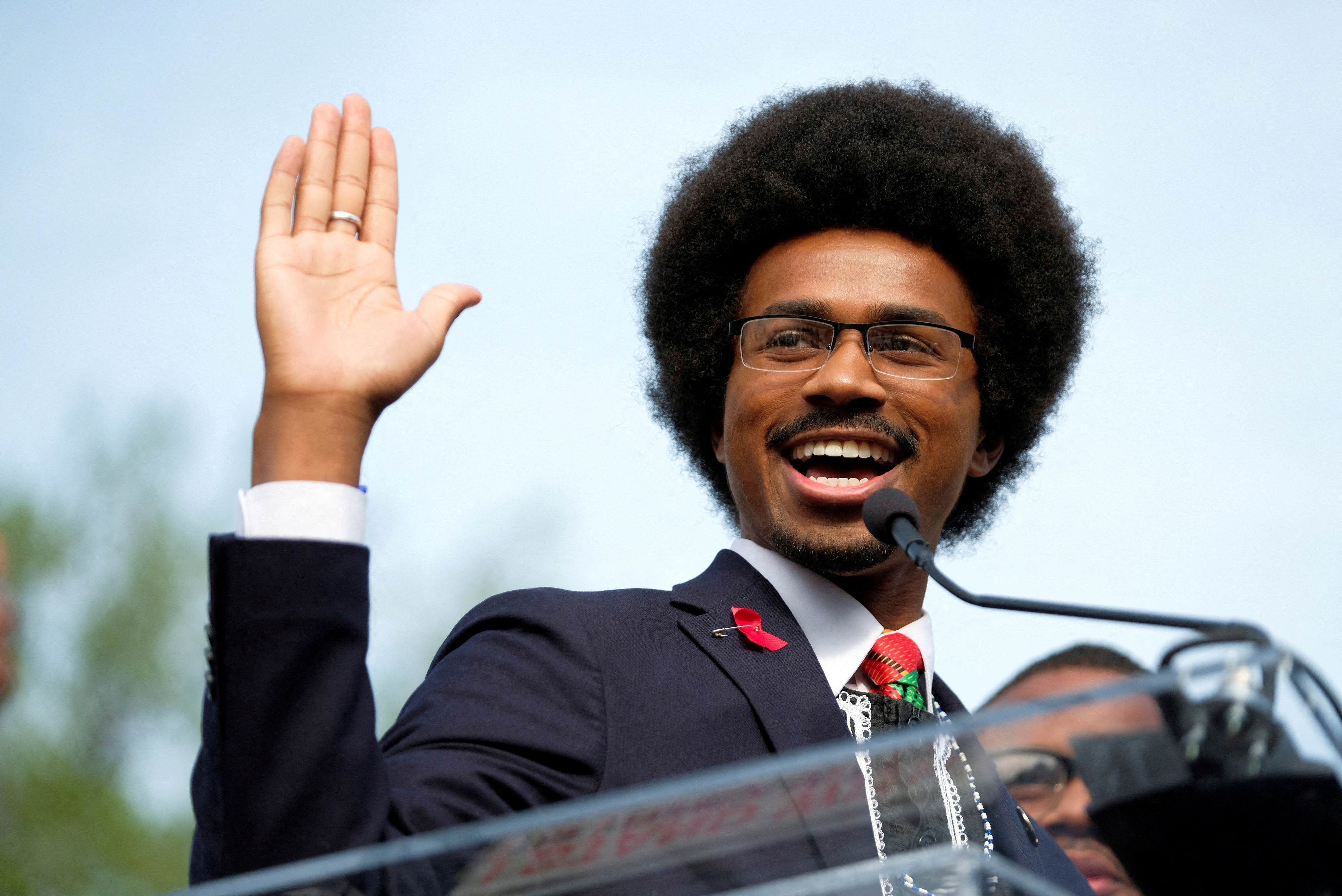 Democratic Tennessee state Representative Justin Pearson who was ousted from the Tennessee House of Representatives along with another young Black colleague for breaking decorum with a gun control demonstration on the House floor, is sworn in before returning to the state legislature after being reinstated in Nashville, Tennessee, U.S., April 13, 2023. REUTERS/Kevin Wurm