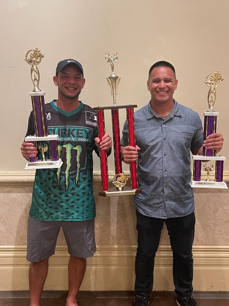 Christian Camacho and James Lujan pose with their trophies after winning the ATV Enduro event of Smokin' Wheels 2023 on Guam.