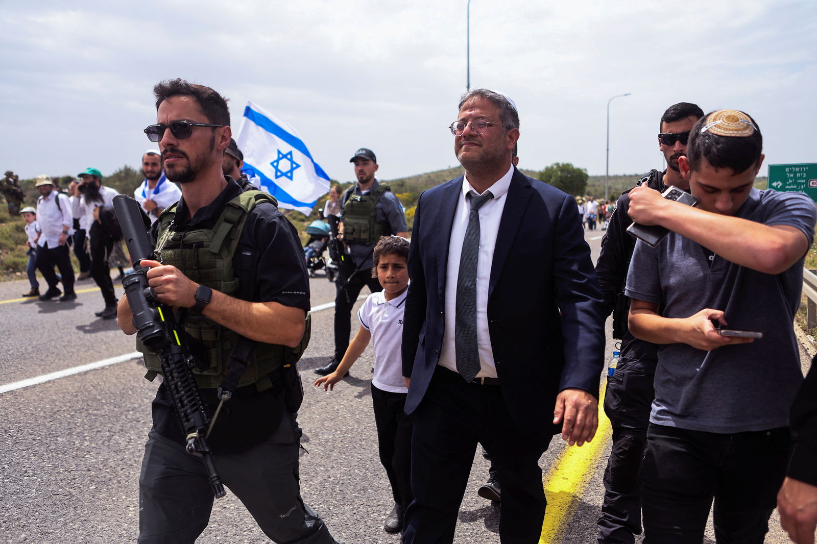 Israeli Security Minister Itamar Ben-Gvir joins Israeli settlers as they hold a protest march from Tapuach Junction to the Israeli settler outpost of Evyatar, in the Israeli-occupied West Bank, April 10, 2023. REUTERS/Nir Elias