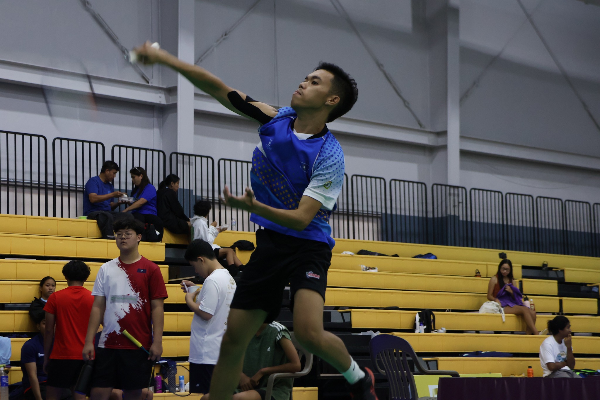 Leonard Manuel connects the smash return during a Tan Holdings Cup game at the Ada gym over the weekend.
