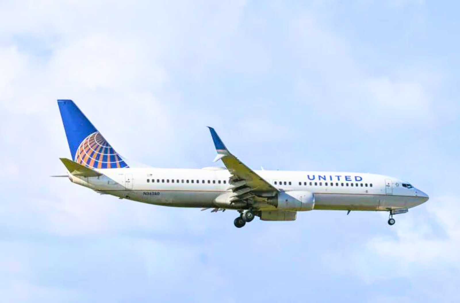 A United Airlines plane comes in for a landing at the A.B. Won Pat International Airport on Dec. 19, 2022.
