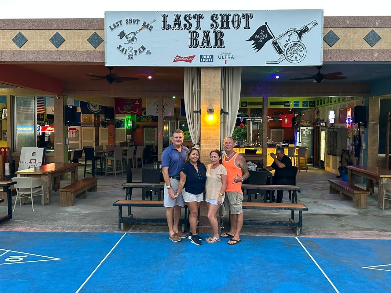 From left, the four owners of Last Shot are Scott and Mara Shular and Travis and Cheyenne Jones.