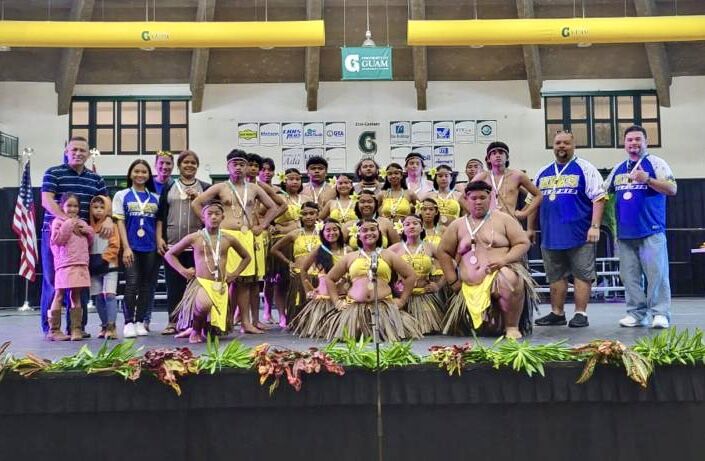 Hopwood Middle School delegates and coaches post for a photo after winning first place in Lålai/Chant at Inacha'igen Fino' CHamoru 2023.