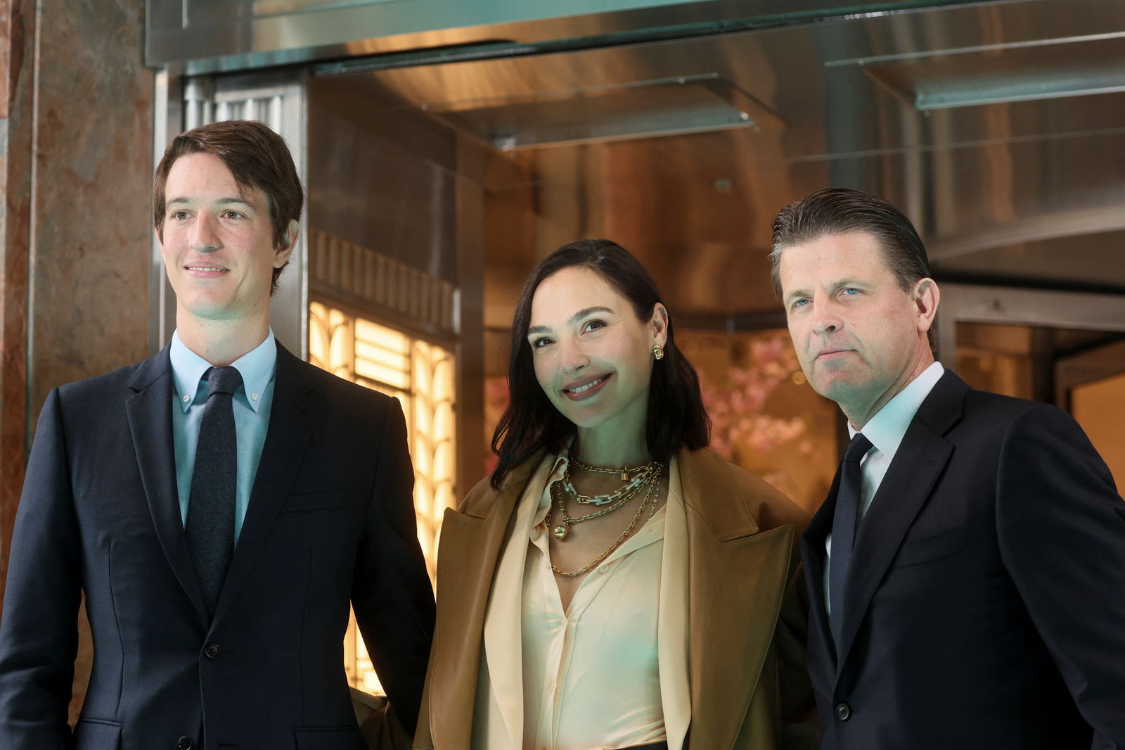 Alexandre Arnault, Tiffany & Co. Global Brand Ambassador Gal Gadot and President and Chief Executive officer of Tiffany & Co Anthony Ledru attend a ribbon cutting ceremony for reopening of the Tiffany flagship store on 5th Avenue in Manhattan in New York City, New York, U.S., April 26, 2023. REUTERS/Brendan McDermid