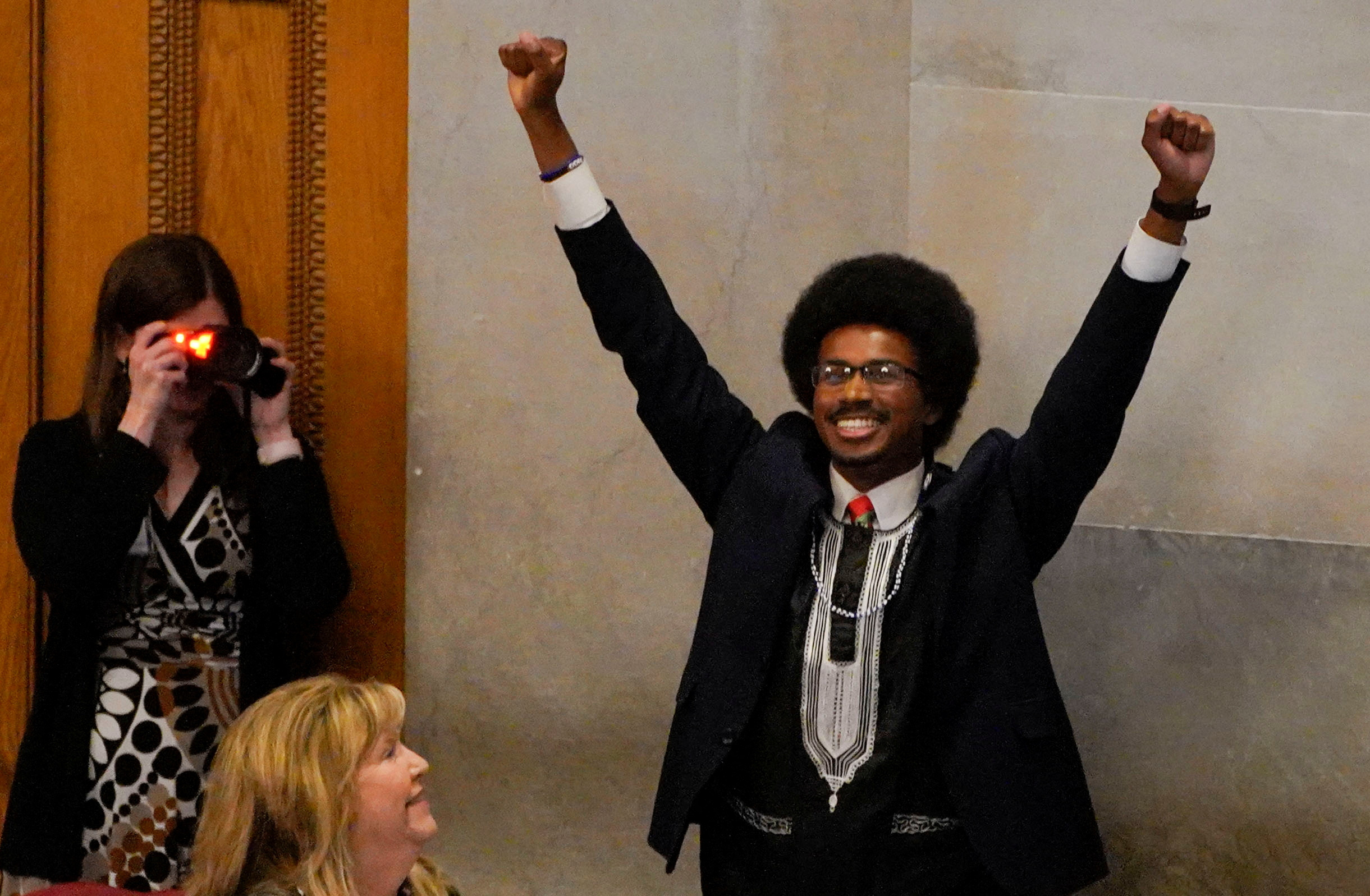 Democratic Tennessee state Representative Justin Pearson, who was ousted from the Tennessee House of Representatives along with another young Black colleague for breaking decorum with a gun control demonstration on the House floor, reacts as he returns to the state legislature after being reinstated in Nashville, Tennessee, U.S., April 13, 2023. REUTERS/Cheney Orr
