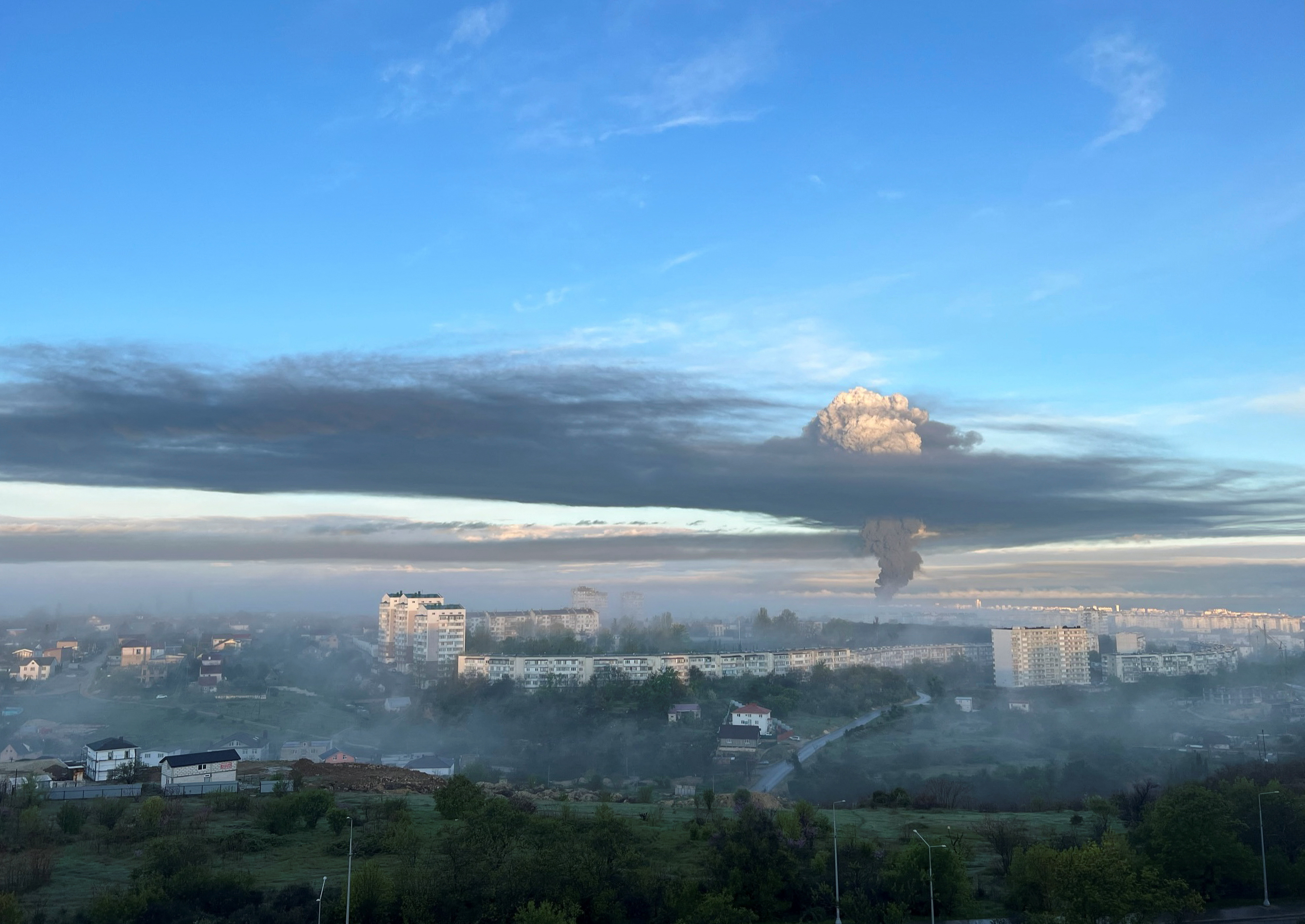 A view shows smoke rising following an alleged drone attack in Sevastopol, Crimea, April 29, 2023. REUTERS/Stringer