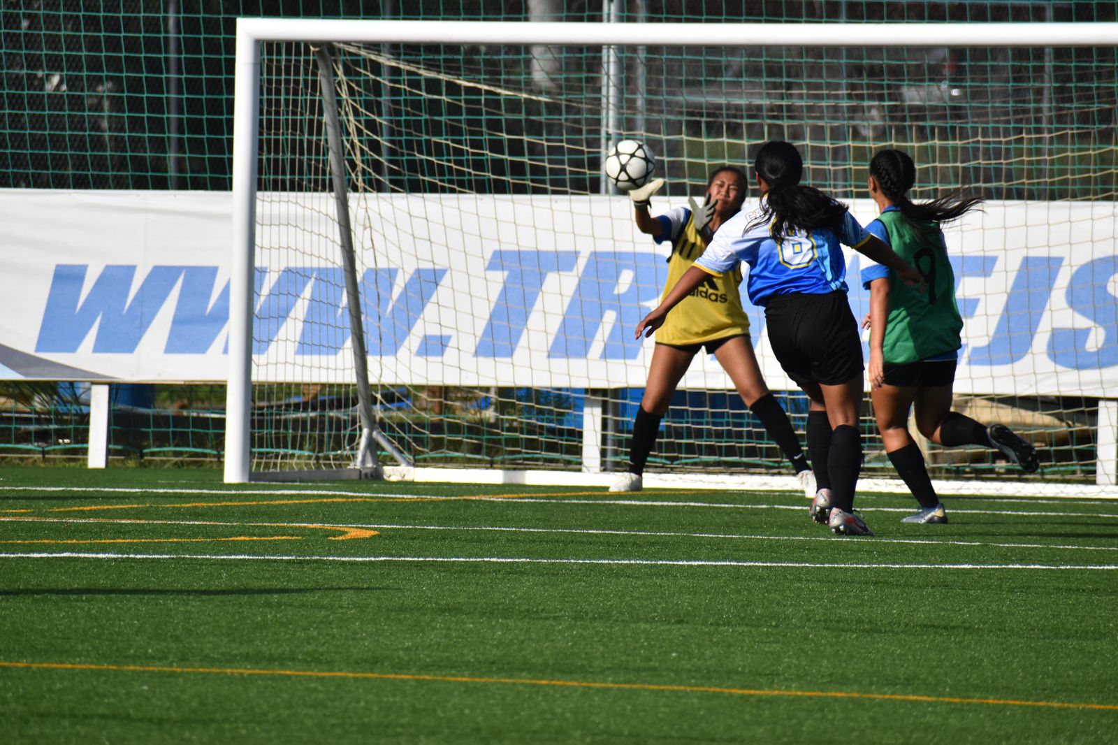 MHS' Jannah Casarino attempts a goal against SIS during a girls high school division game of the NMIFA-PSS Interscholastic Soccer League  at the NMI Soccer Training Center in Koblerville.