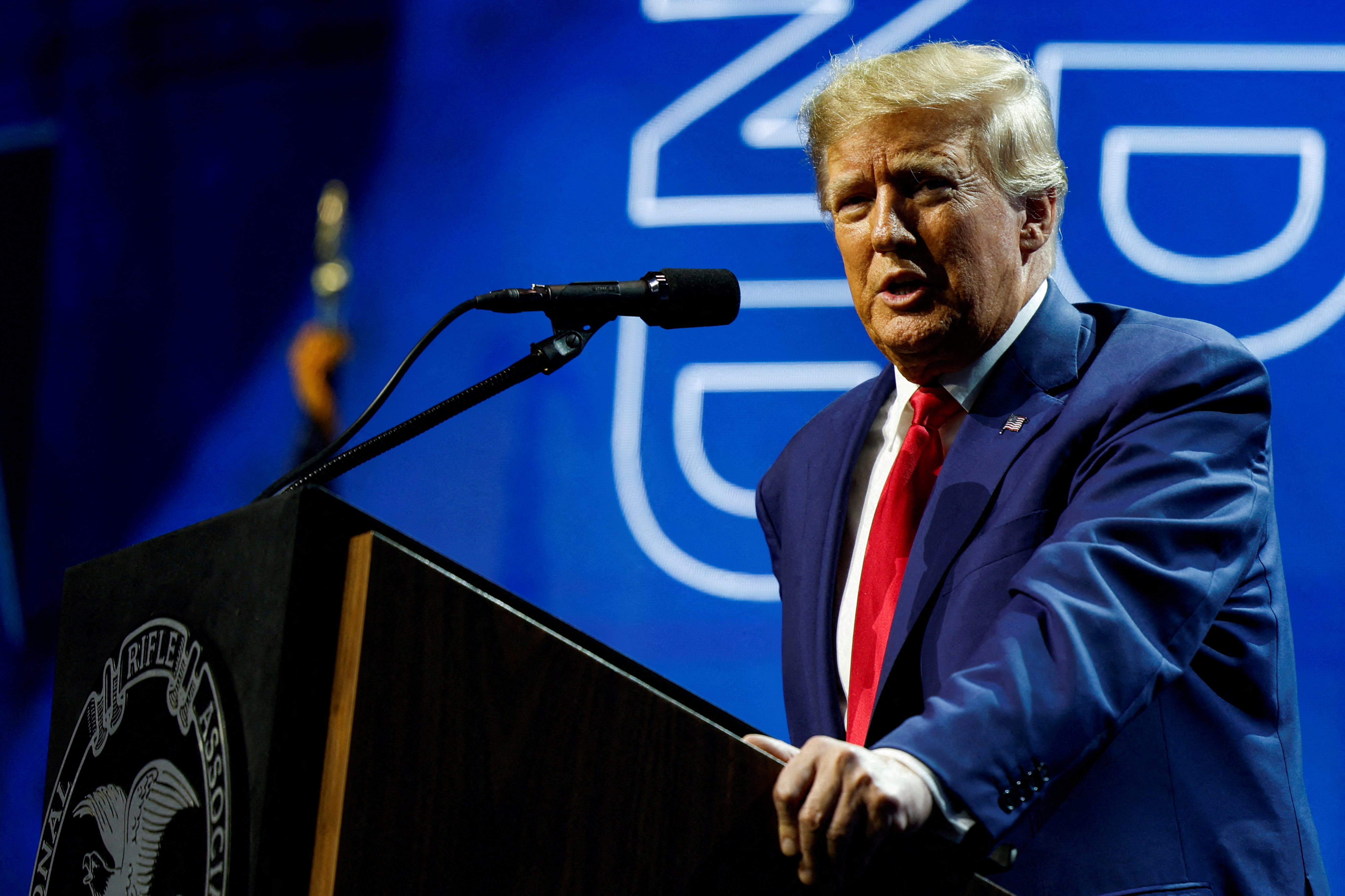 FILE PHOTO: Former U.S. President Donald Trump speaks the National Rifle Association (NRA) annual convention in Indianapolis, Indiana, U.S., April 14, 2023. REUTERS/Evelyn Hockstein/File Photo