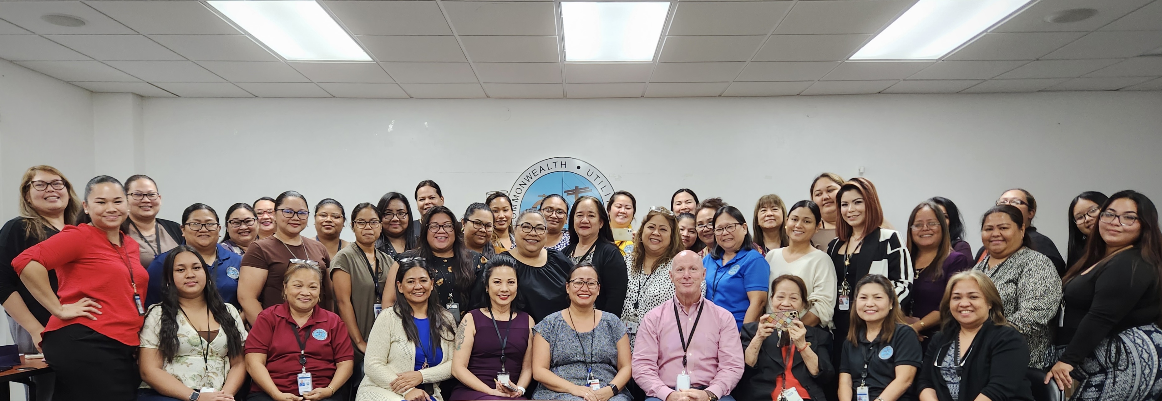 As March, the Women’s International Month, comes to an end,  Commonwealth Utilities Corporation Board  Chair pro tem Janice A. Tenorio, center, standing, second row, acting CUC Executive Director Dr. Dallas M. Peavey Jr., seated front row, fourth right, and management recognize CUC’s diverse women employees, who range from engineers to trades and tech workers, managers to administrative staff and customer service representatives. CUC recognizes the value and importance of their women employees who play a great contribution to the work force of the Commonwealth of the Northern Mariana Islands. 