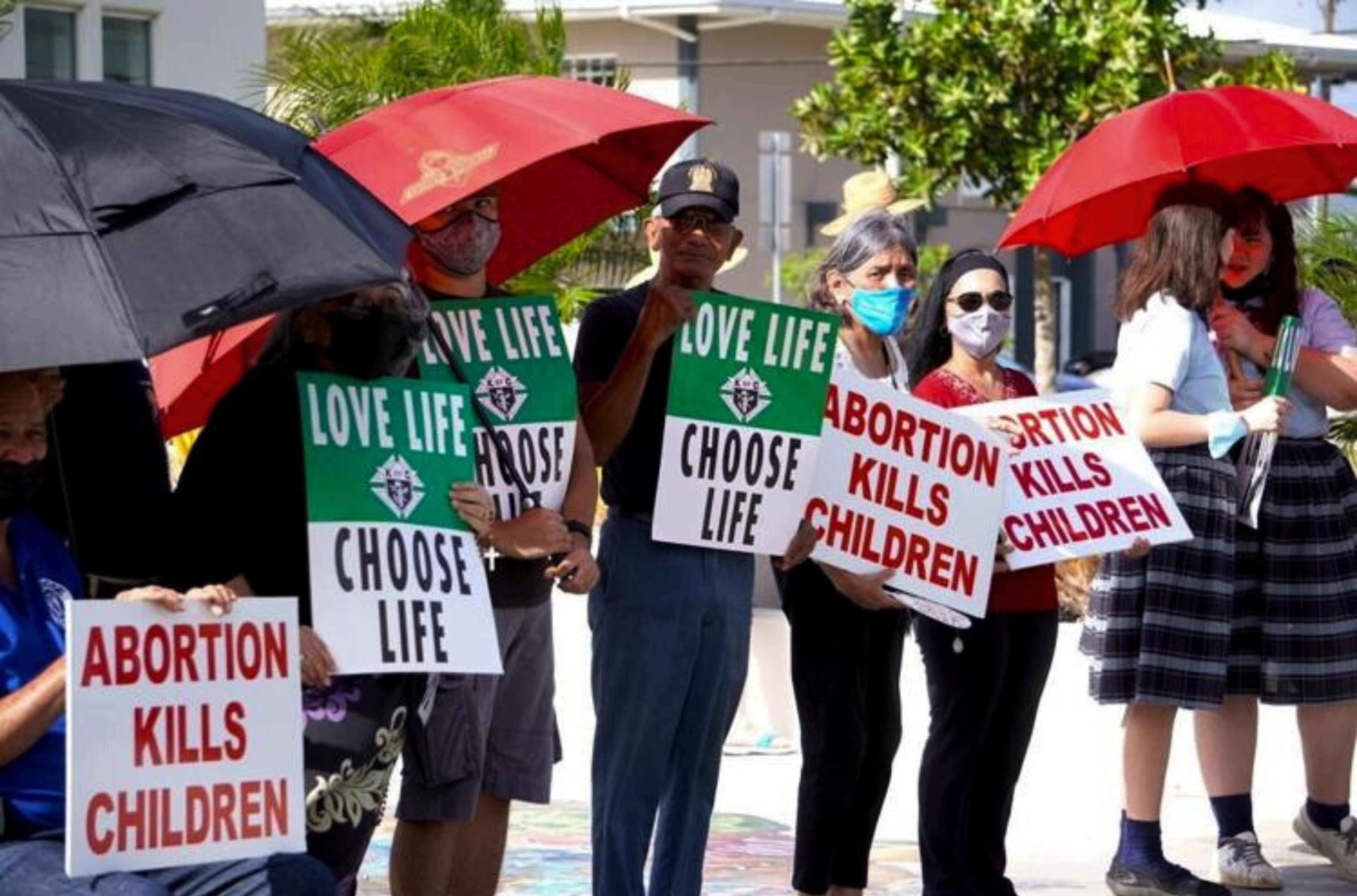 Dozens of anti-abortion protesters gather May 3, 2022, in front of the Guam Congress Building in Hagåtña. A new bill is proposing to let voters decide whether abortion services will be legal on Guam.   