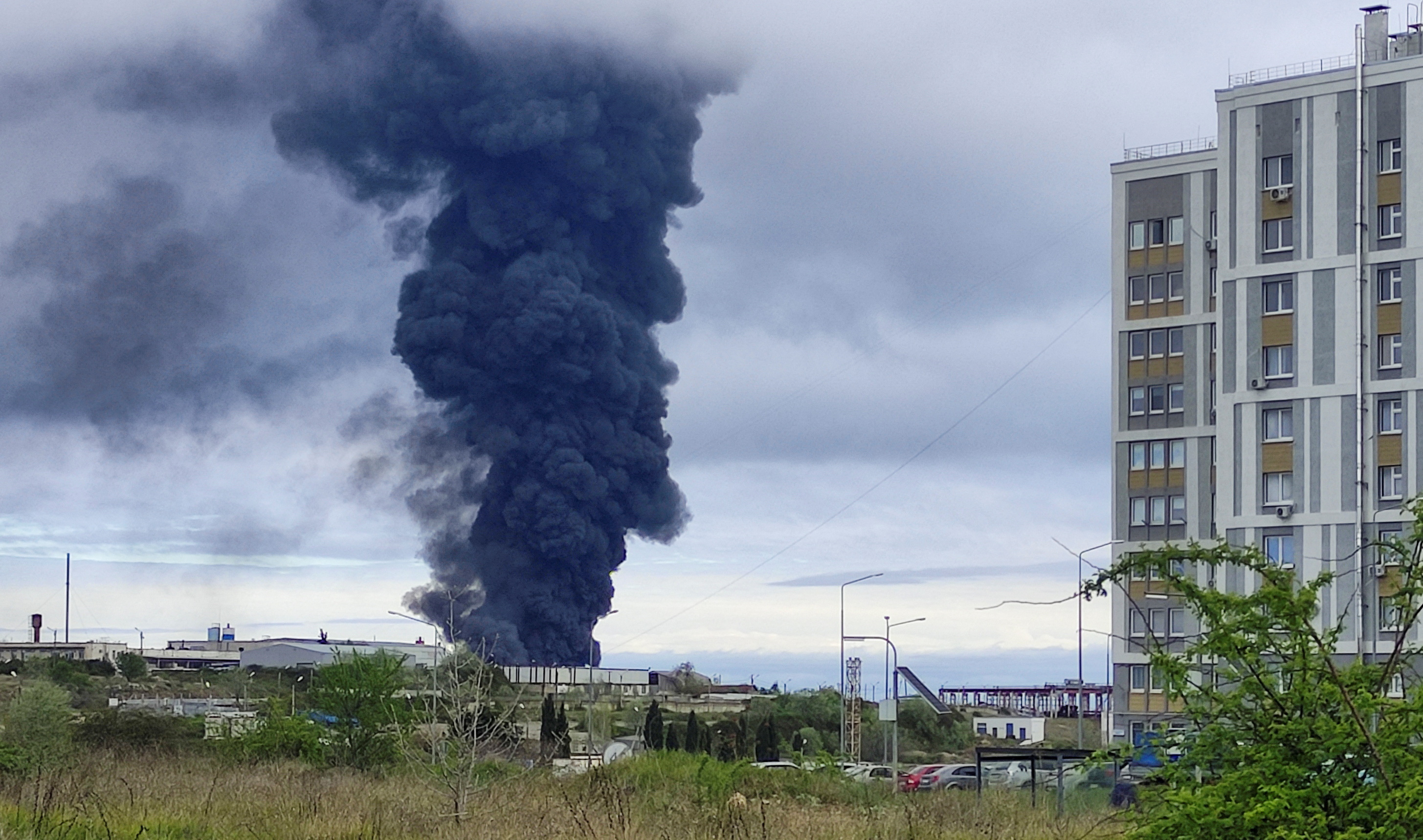 Smoke rises over a fuel tank following an alleged drone attack in Sevastopol, Crimea, April 29, 2023. REUTERS/Stringer