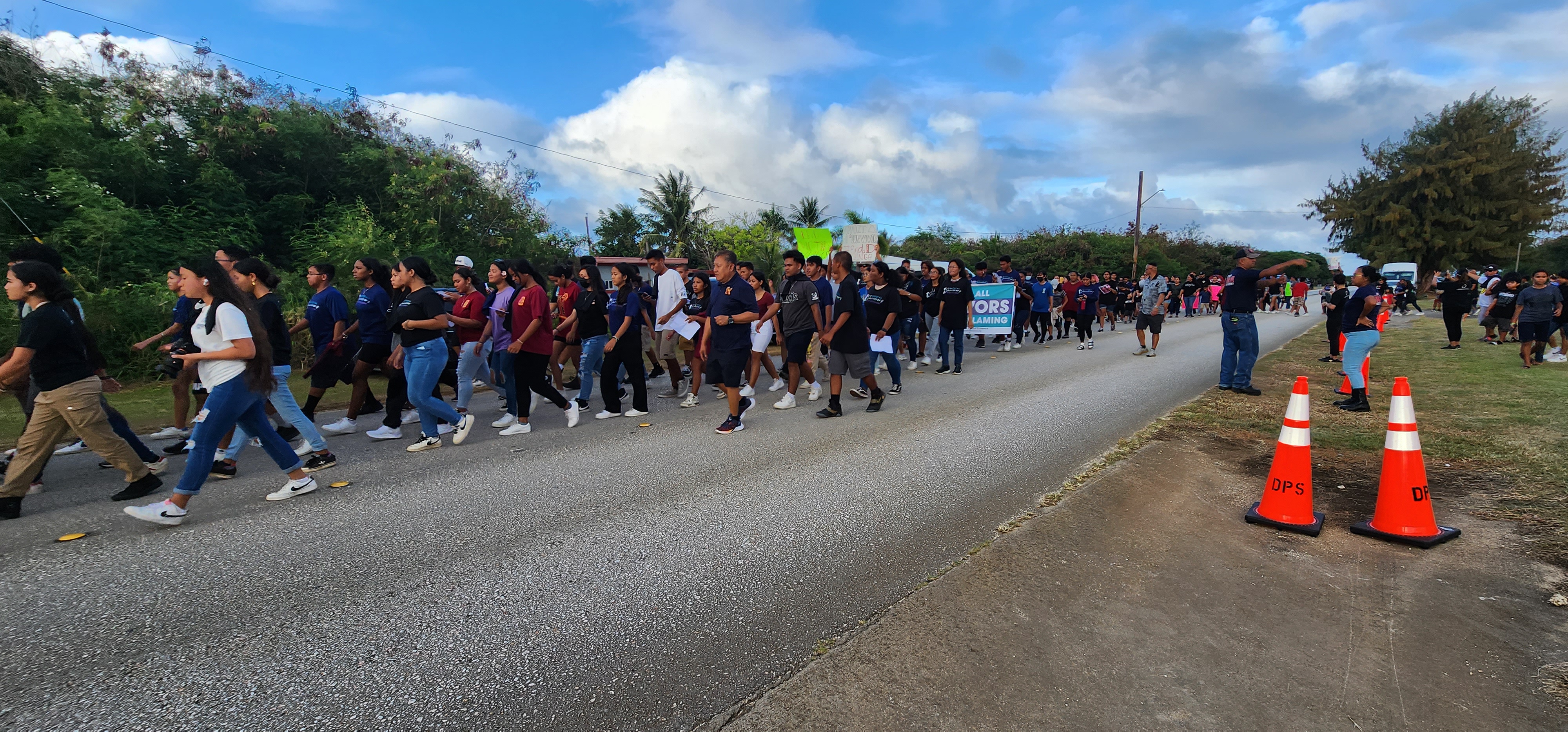 Students of Marianas High School and Kagman High School join the walk against domestic and sexual violence in Kagman on Monday.