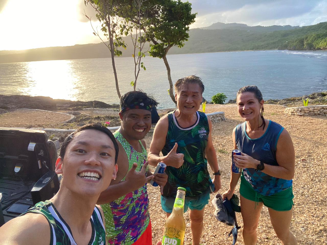 Shigeki Tenorio, left, poses with Simon Necesito, Chong Nam Lee and Terra Allen after completing on Saturday in East Bay.