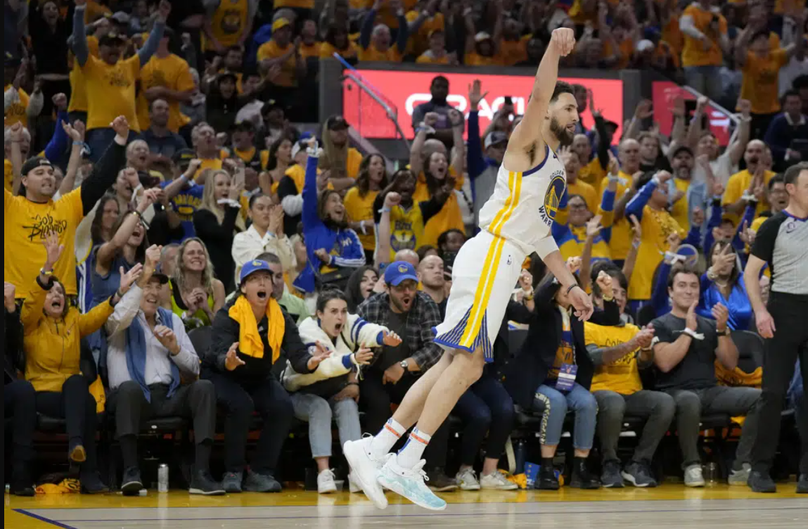 Nancy Pelosi and her husband, Paul Pelosi, from bottom left, celebrate as Golden State Warriors guard Klay Thompson gestures after making a 3-point basket against the Sacramento Kings during the second half of Game 4 in the first round of the NBA basketball playoffs in San Francisco, Sunday, April 23, 2023.