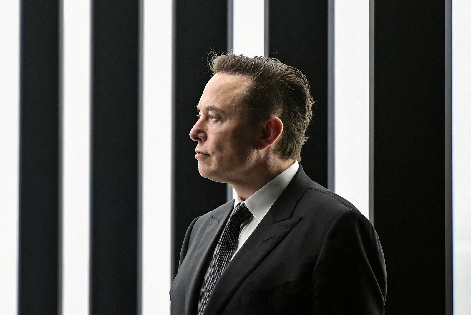 FILE PHOTO: Elon Musk attends the opening ceremony of the new Tesla Gigafactory for electric cars in Gruenheide, Germany, March 22, 2022. To match Special Report TESLA-PRIVACY/CAMERAS Patrick Pleul/Pool via REUTERS/File Photo
