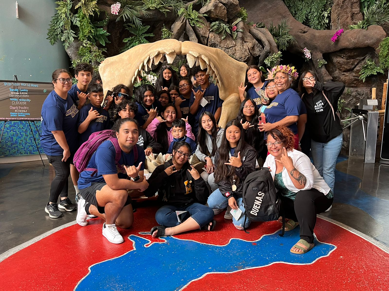 The Francisco M. Sablan Middle School team members with their coaches-educators.